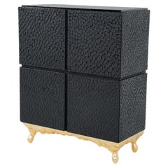 Contemporary Four-Door Cabinet with Textured Black and Gold Leaf Finish