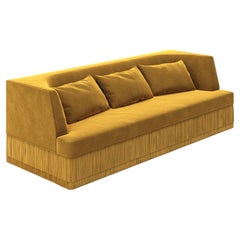 Alcove Linear Sofa – Curved Backseat with Fringe Base In Honey Velvet