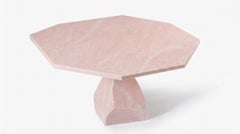 Faceted Dining Table Carved from a Single Block of Estremoz Rose Marble