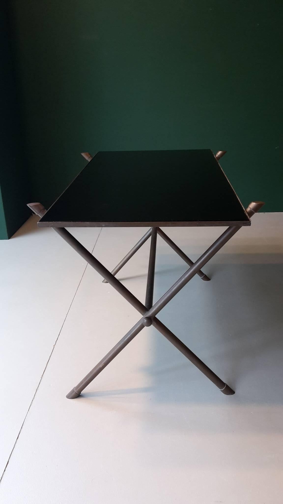 20th century French coffee table from the 1960s made of brass and black glass.