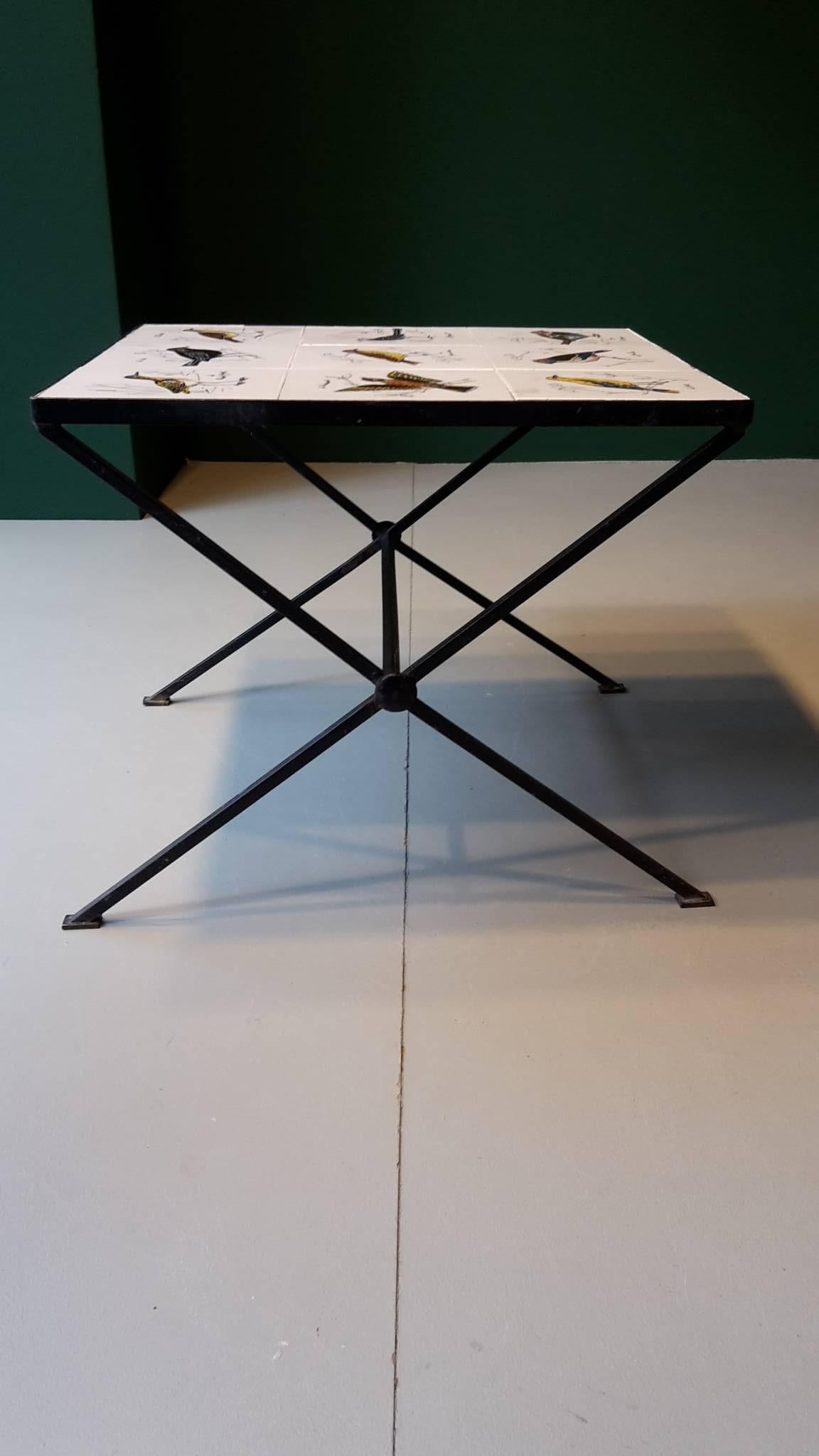 20th century French coffee table made of metal and ceramic tiles with painted birds, 1960s.