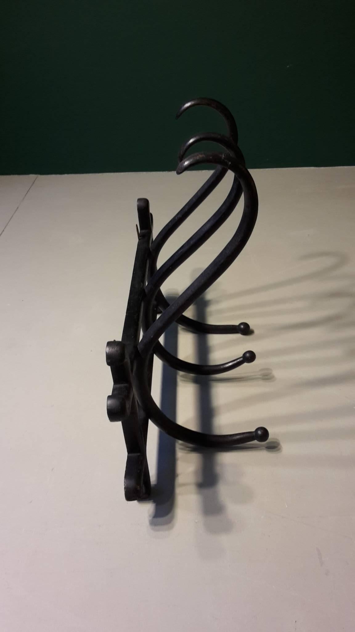 Early 20th century German black wall coat rack made of bentwood by Thonet.