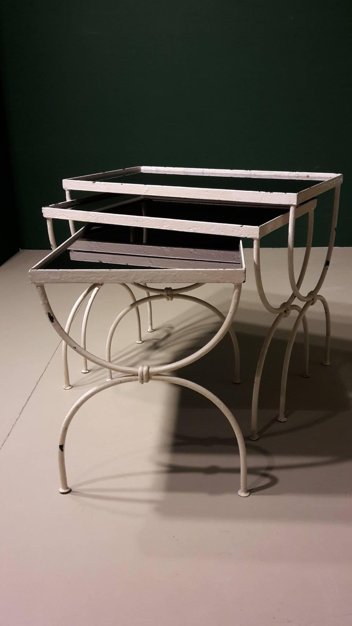 20th Century French nest of tables made of white metal and black glass from the 1950s.