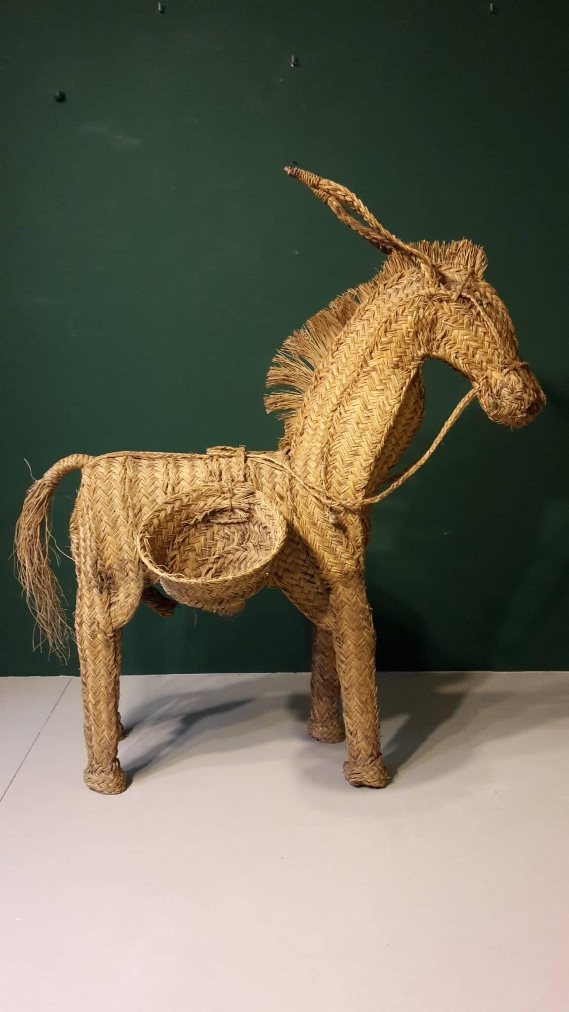 20th century French folk art donkey made of palm frond, 1960s.