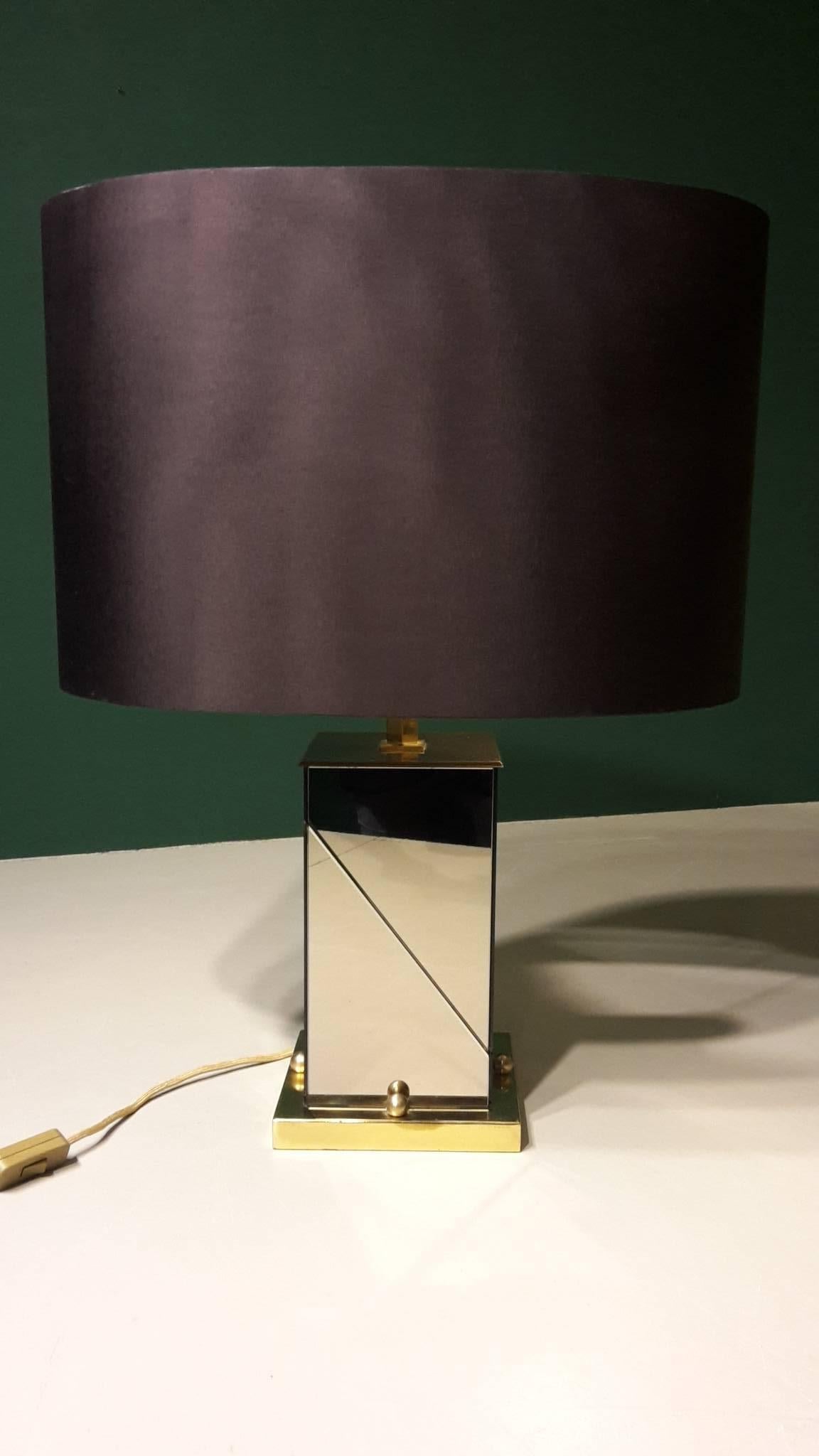 20th century Italian table lamp by Romeo Rega made of mirror and brass from the 1970s.