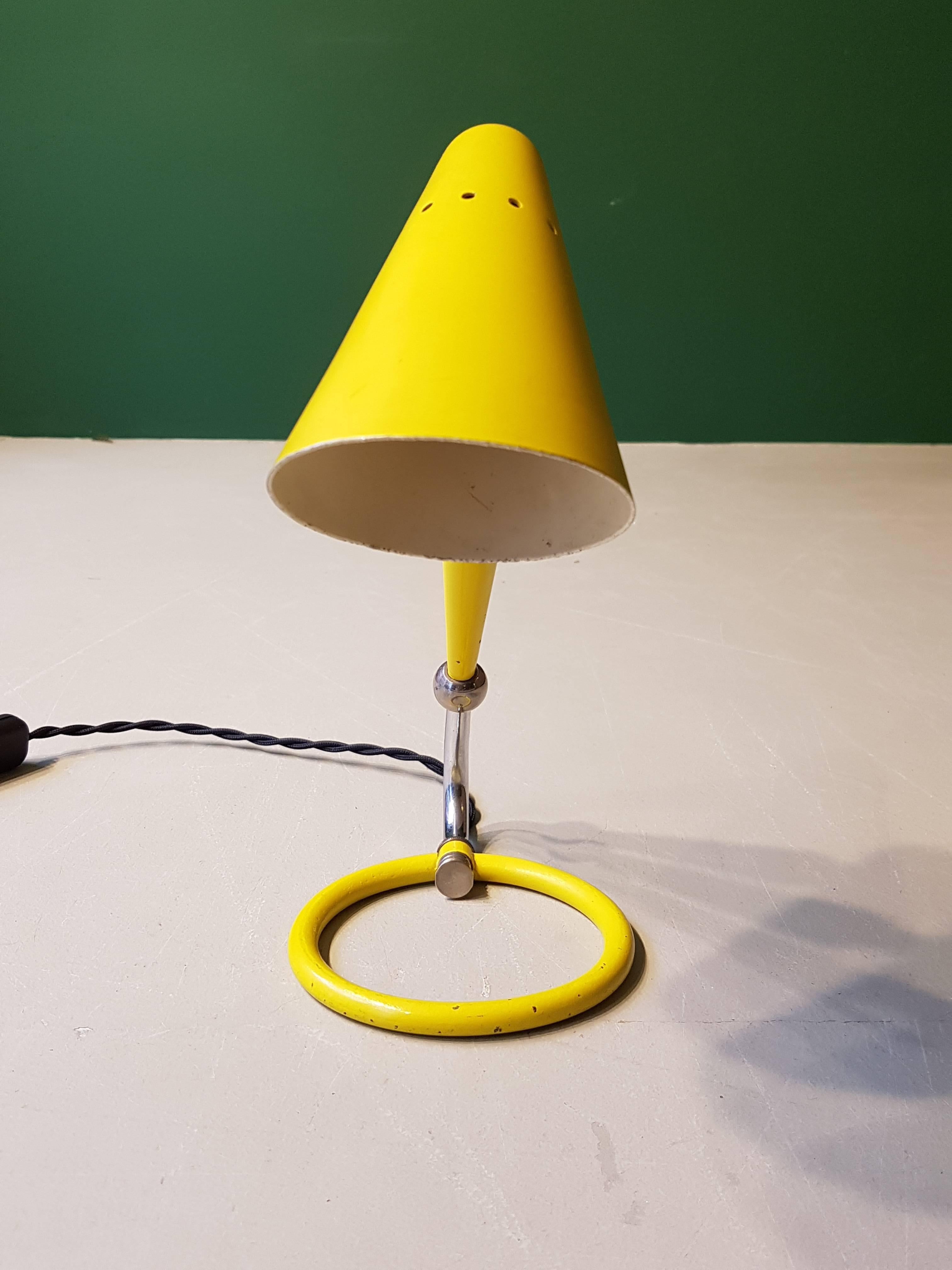 20th century French yellow reading lamp made of metal, 1960s.