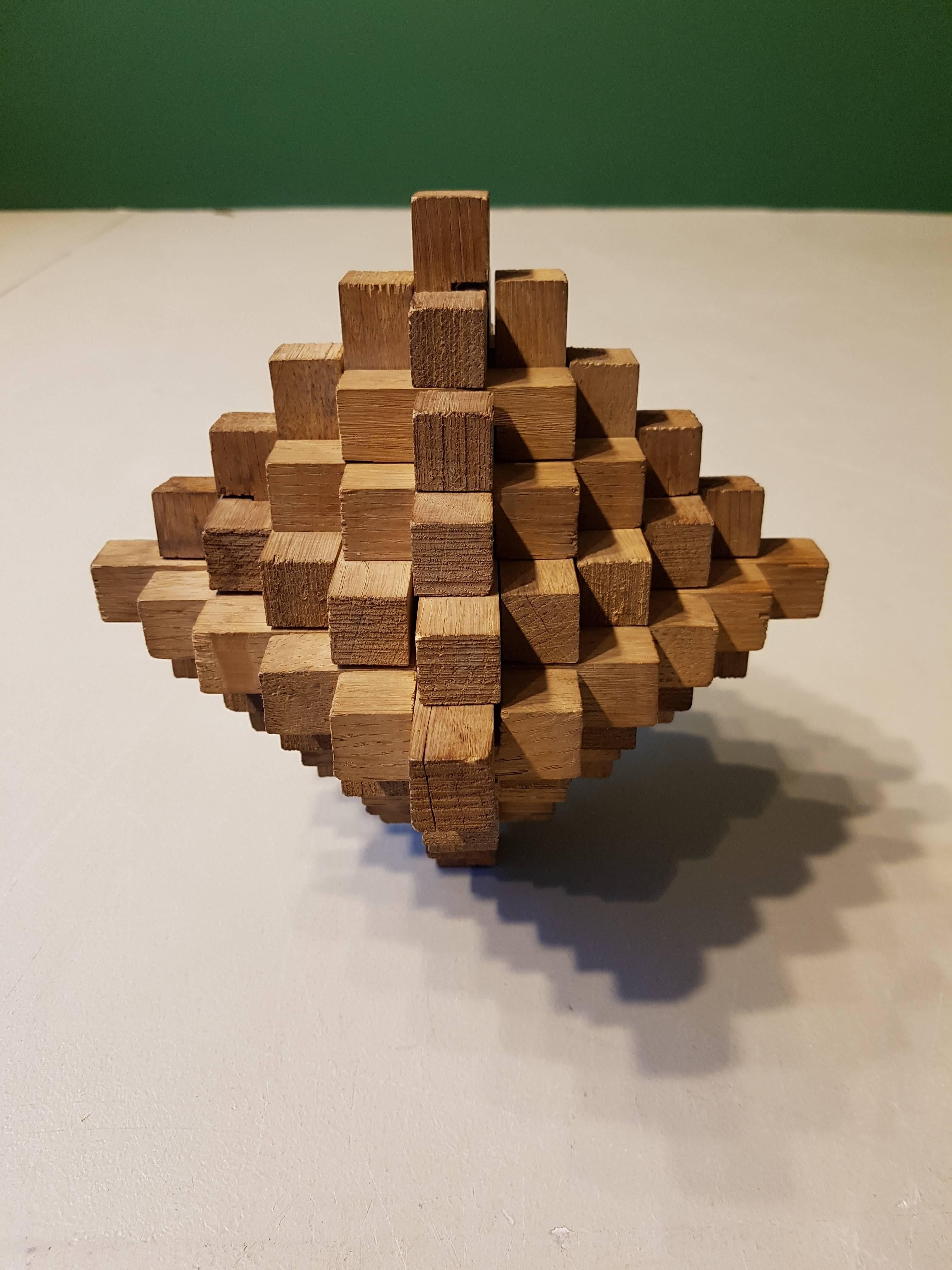 20th century French geometric sculpture made of oak.