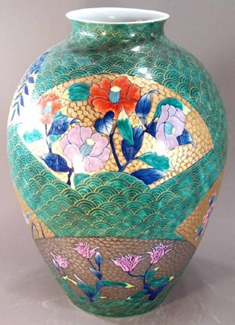 Breathtaking very large contemporary Japanese green porcelain vase, intricately gilded and hand painted on a stunning baluster shape body, a signed masterpiece by master porcelain artist from the Arita-Imari region in Japan .  In 2016, the British