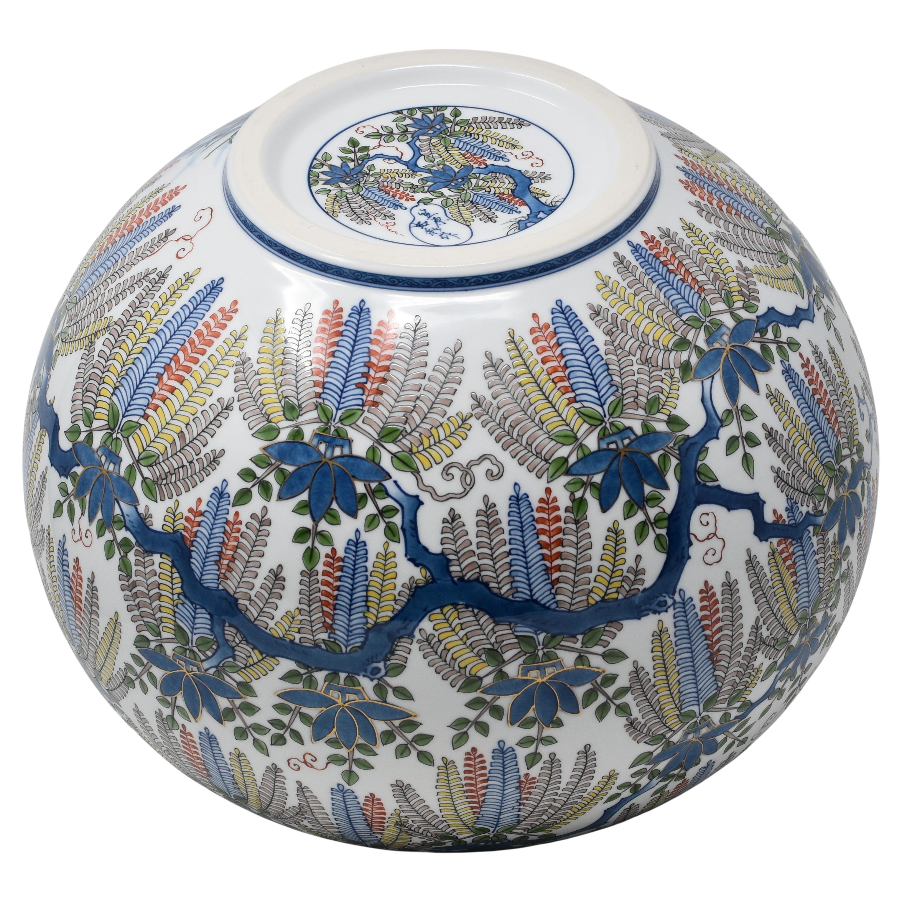 white ceramic rectangular vase