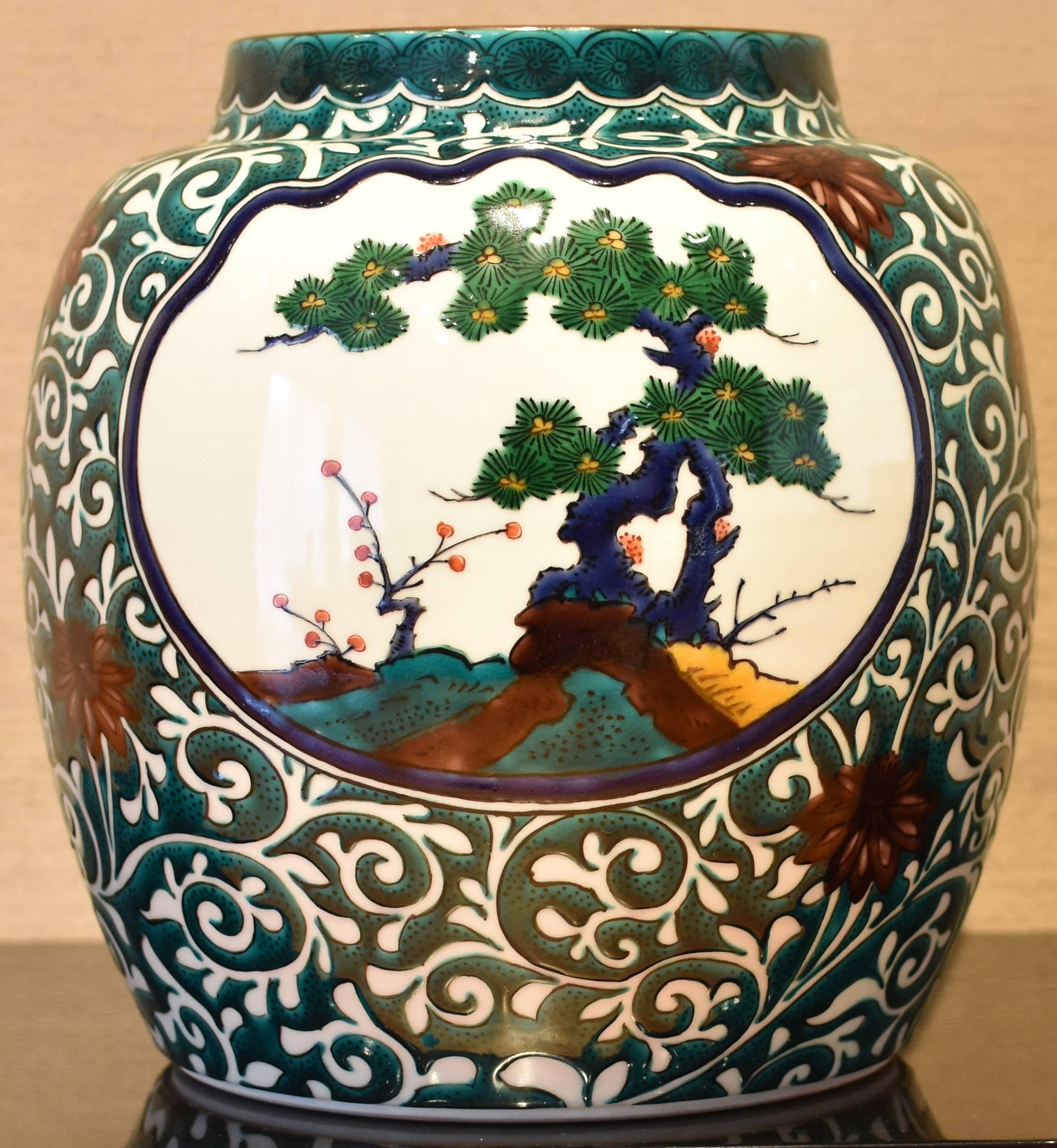 Exceptional Japanese contemporary Kutani decorative green porcelain vase, hand-painted on a strikingly shaped body, a signed masterpiece by  the third generation master of a Kutani kiln with a history of more than 140 years. This artist's life and