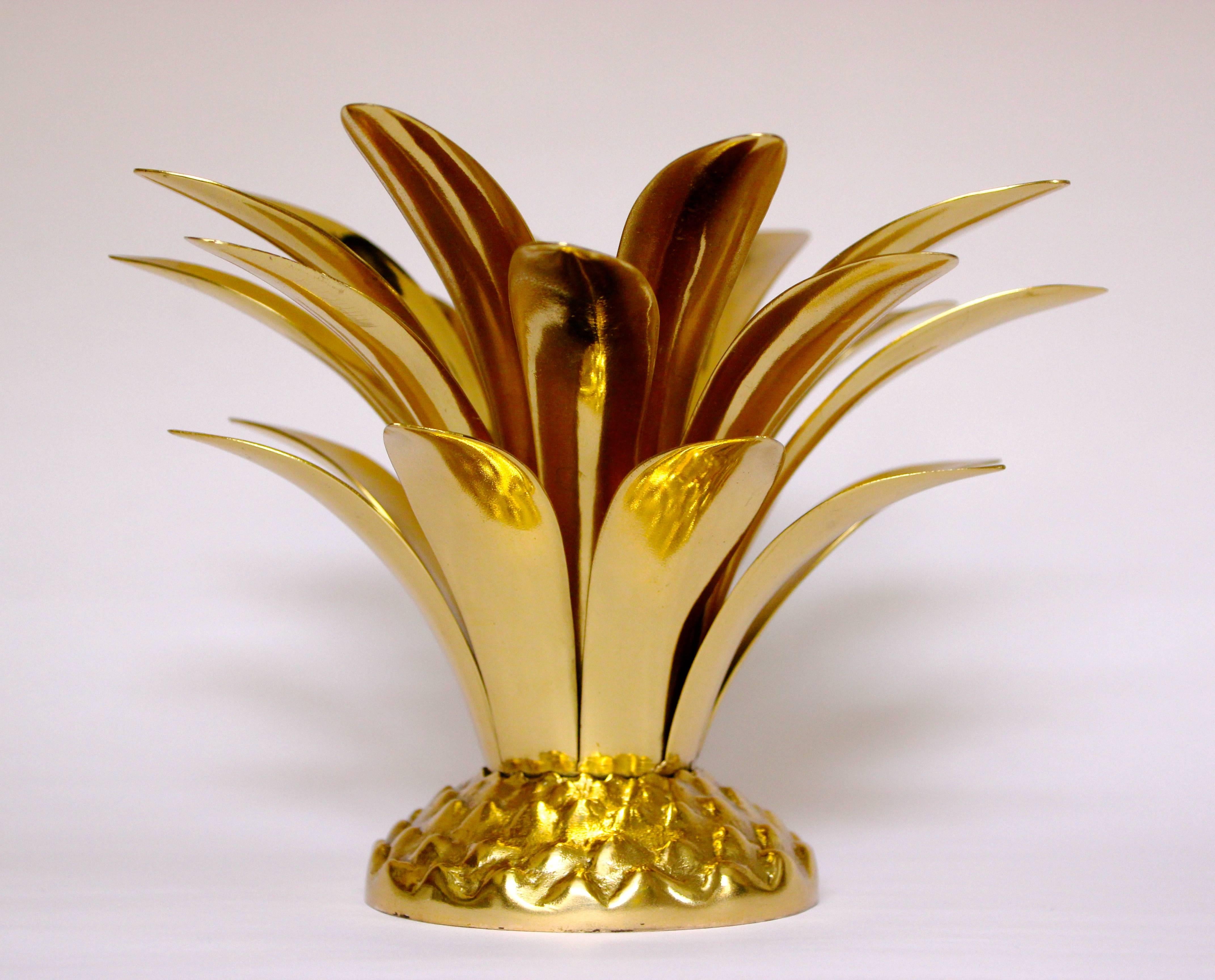 Charming handmade cast brass candleholder pineapple inspired combining textured and polished finishes.

Handmade individually. Cast using very traditional techniques, those original candleholders are polished revealing the lustrous finish of this