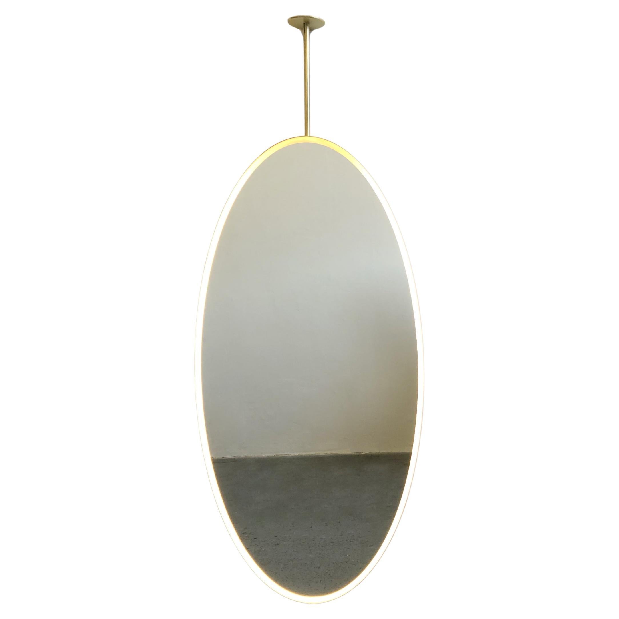 Ovalis Ceiling Suspended Oval Mirror with a Brass Frame and Front Illumination For Sale