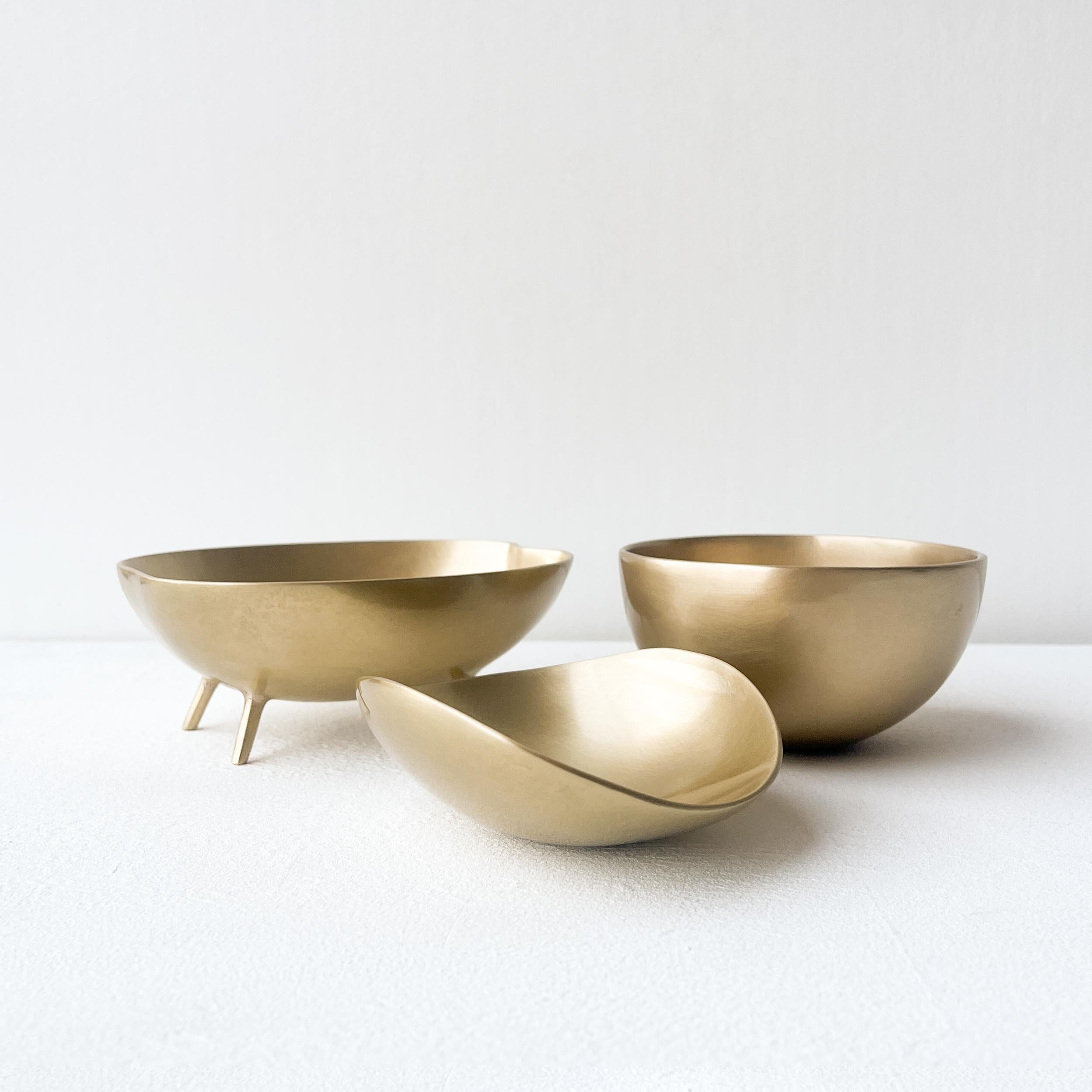 Set of three mixed handmade brushed cast brass decorative bowls.

Each of those original and elegant bowls are handmade individually. Cast using very traditional techniques.

Slight variations in patterns and sizes are characteristics of such