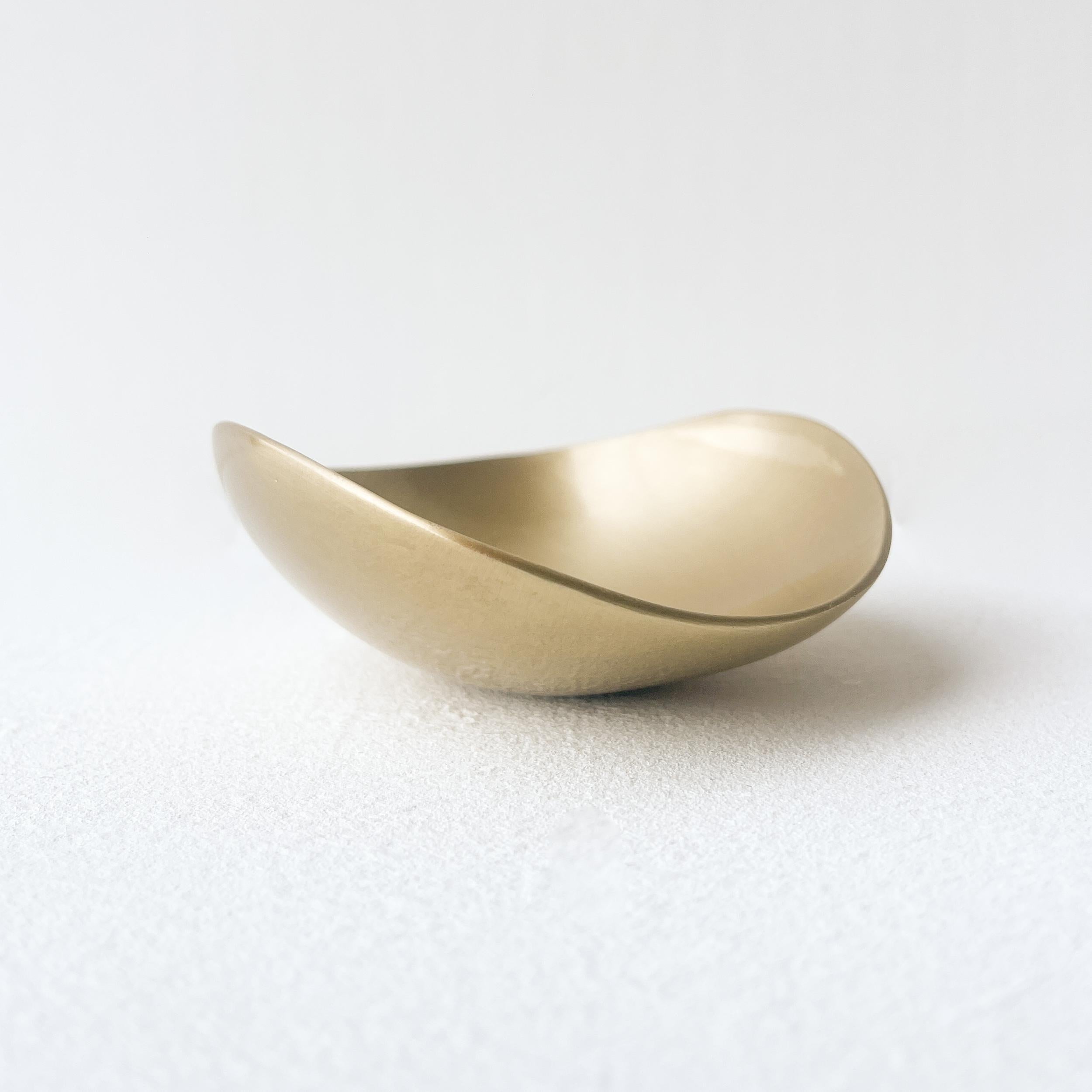 Handmade brushed cast brass shallow bowl. Each of those original and elegant bowls are handmade individually. Cast using very traditional techniques.

Slight variations in patterns and sizes are characteristics of such original handmade creations.