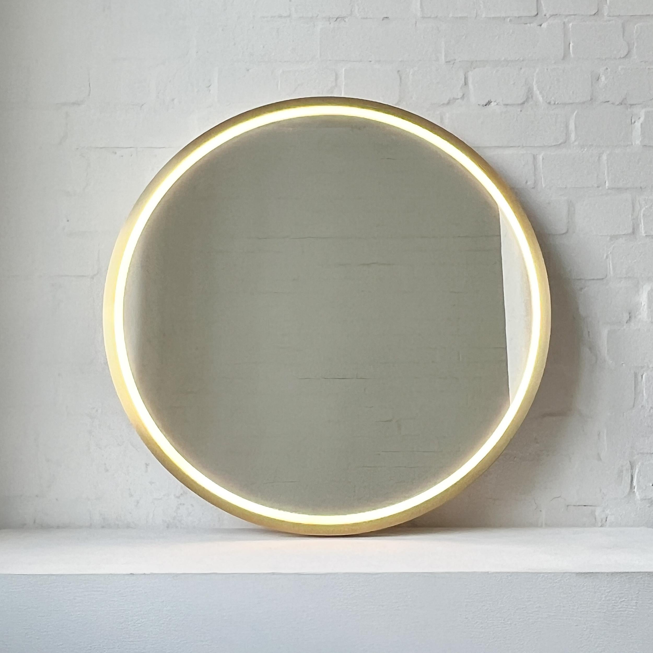 Contemporary Front Illuminated Orbis Round Mirror with Handcrafted Brass Full Frame For Sale