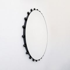 Bobbin Orbis Round Mirror with Decorative Blackened Metal Frame