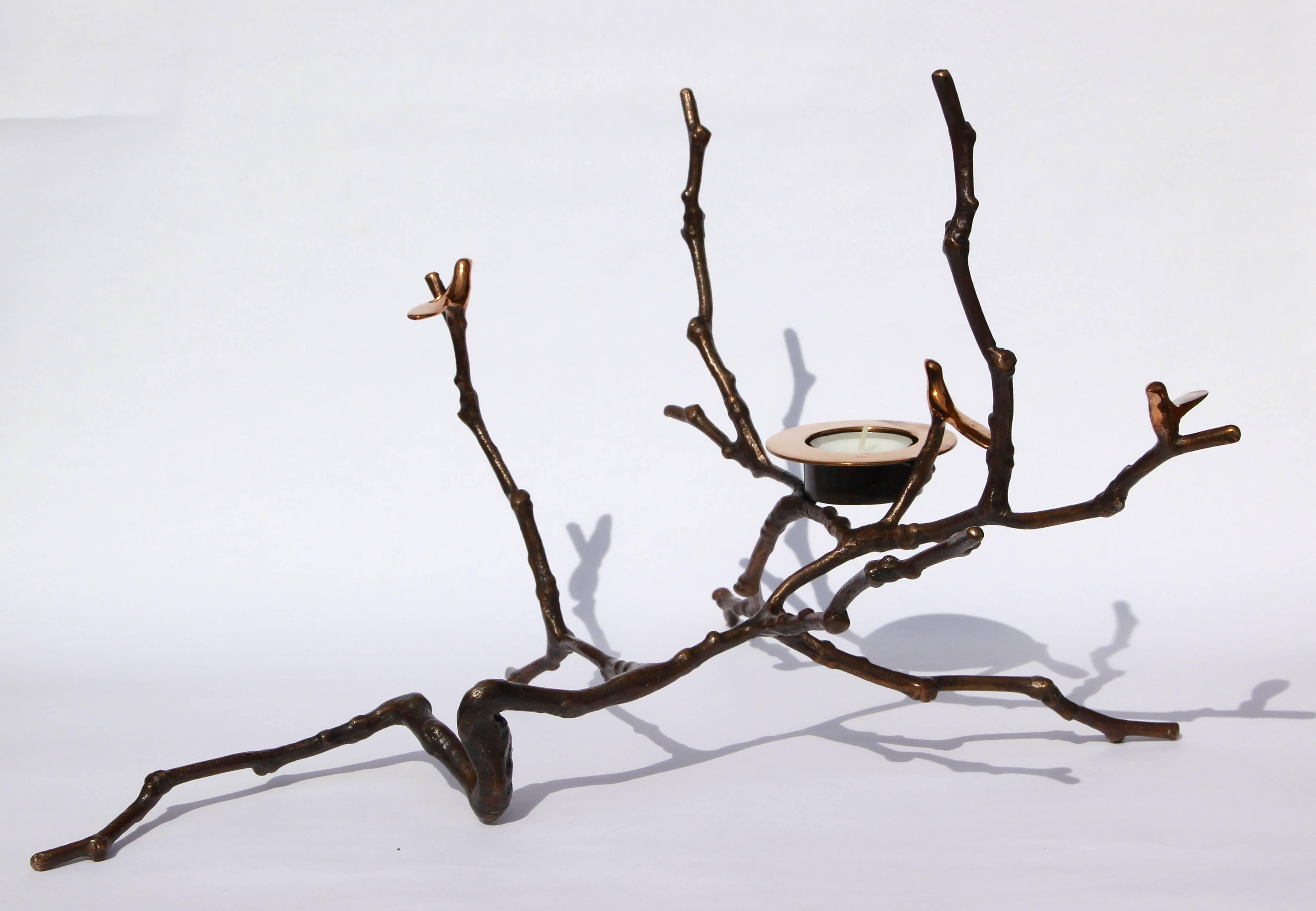 Original, unique and cast in bronze, creating sumptuous and unusual decorative elements for beautiful homes.

Each of these splendid bronze Magnolia Twig T-light holders is handmade individually with incredible detail. Cast using very traditional