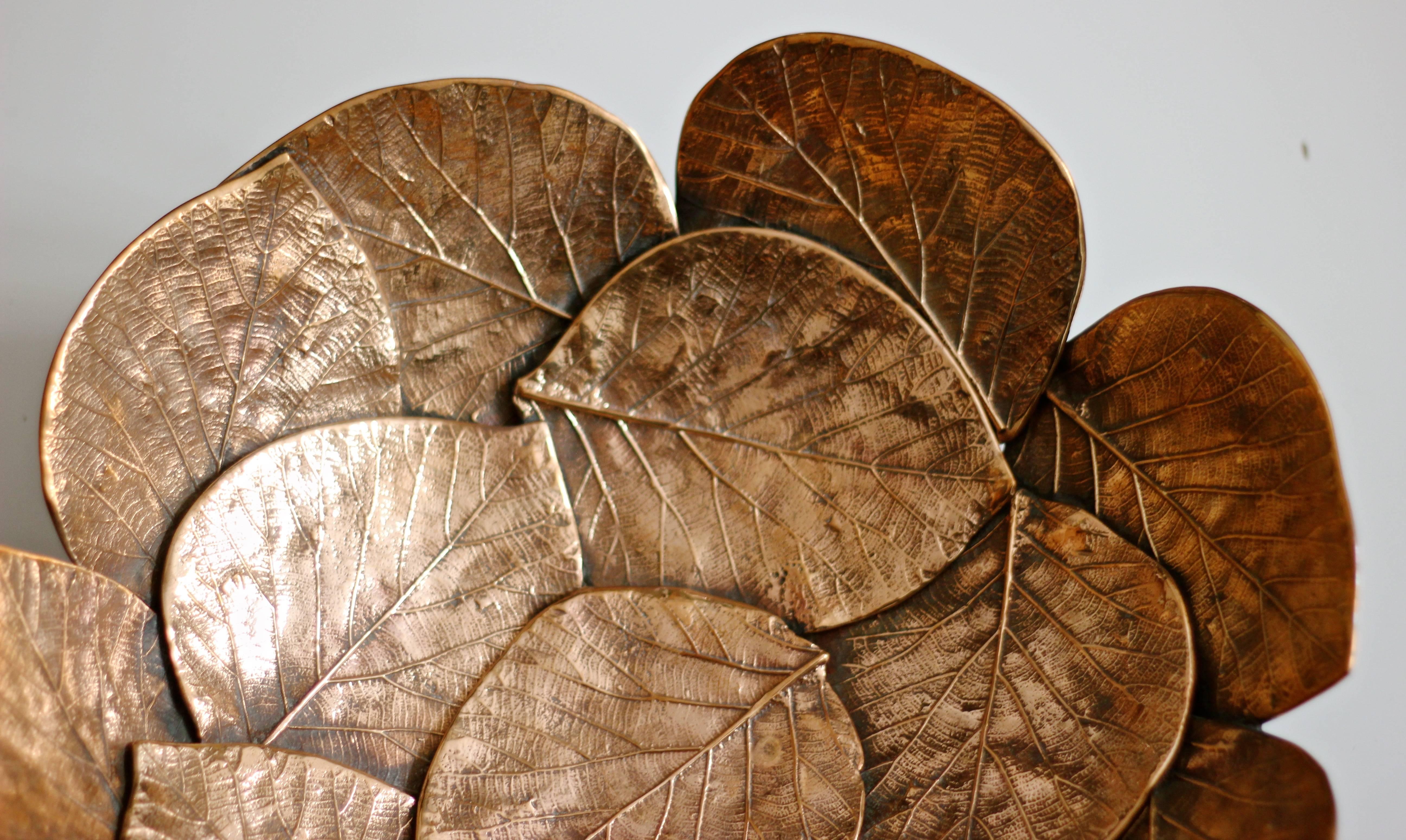 Unique and exquisite brass cast leaf bowl. Handmade using highly skilled and specialised traditional processes to create an original and sumptuous piece.

Slight variations in the patina and polished finishes, patterns and sizes are characteristics