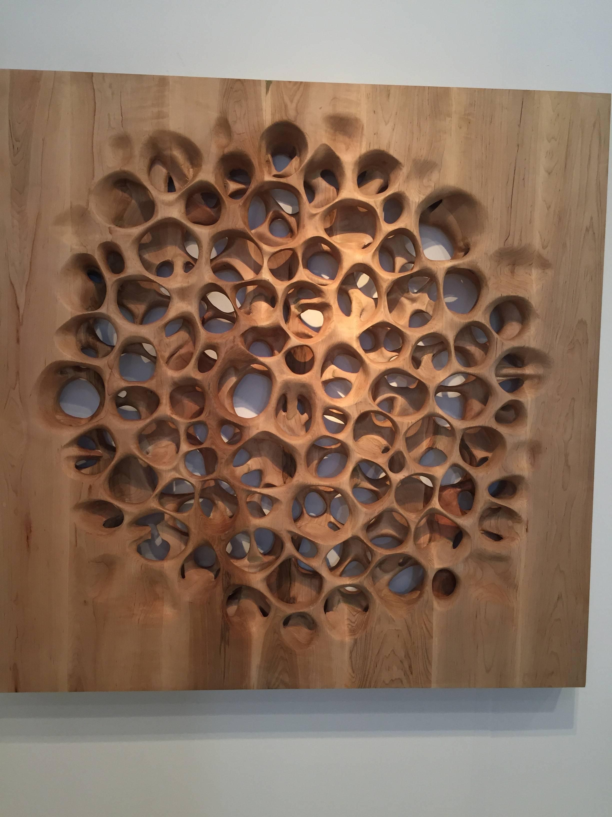 Loop is a custom wall panel made from solid maple wood. Loop is made from two different layers of carved pattern laminated together. 

The pattern and design can be customized based on your requirements. Amorph provides shop drawings for
