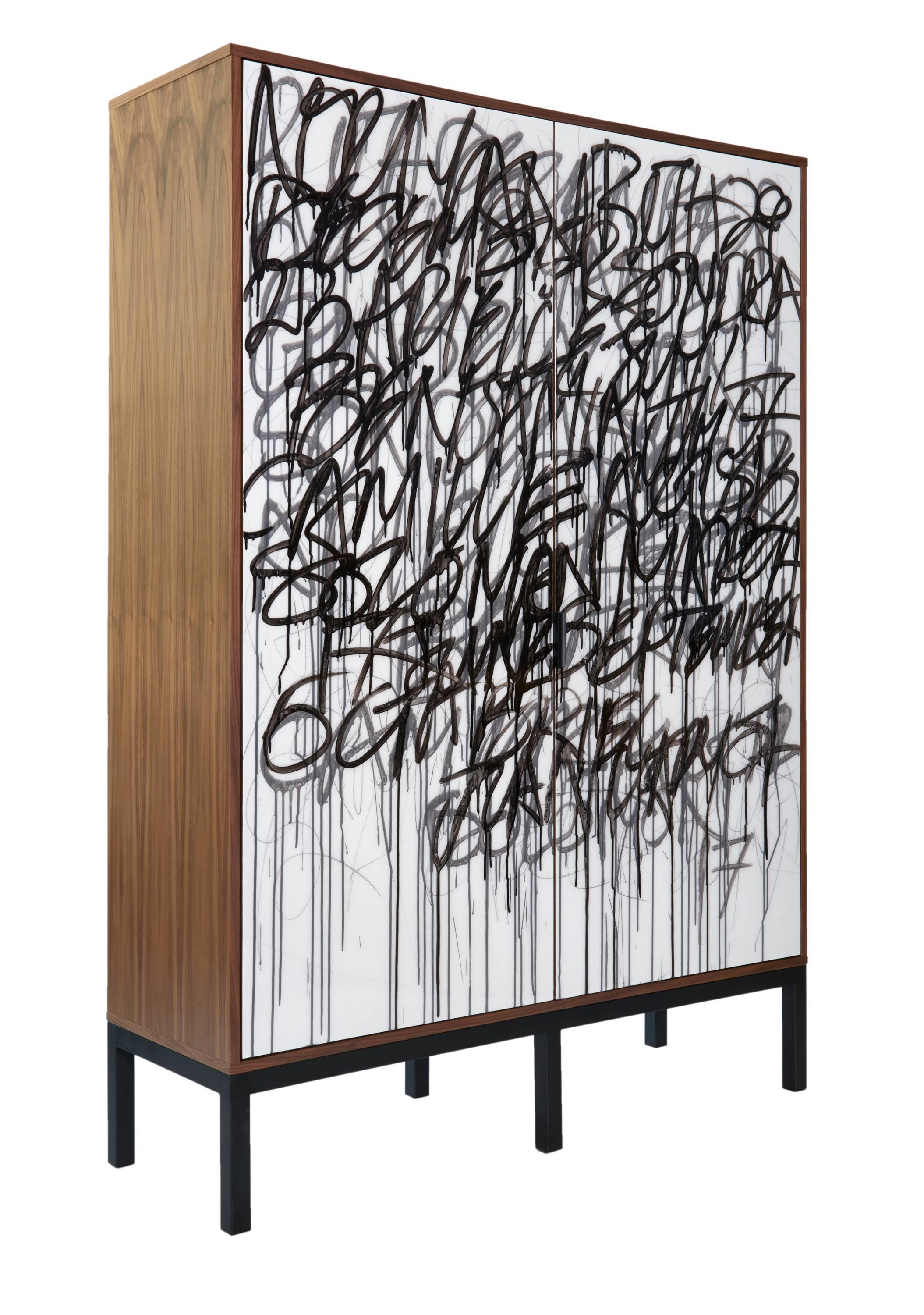 
Our 'Say it Again' cabinet is designed and finished in our Toronto Studio, Morgan Clayhall. 

The client can supply words/poems/names/birthdays, etc that can be incorporated into the artwork on the doors by the artist. 
The art on the doors is mix