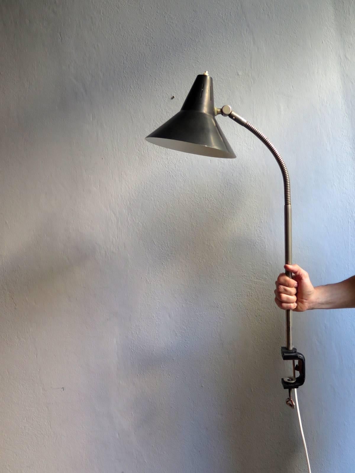 Hala desk lamp with adjustable black spot and flexible arm.
