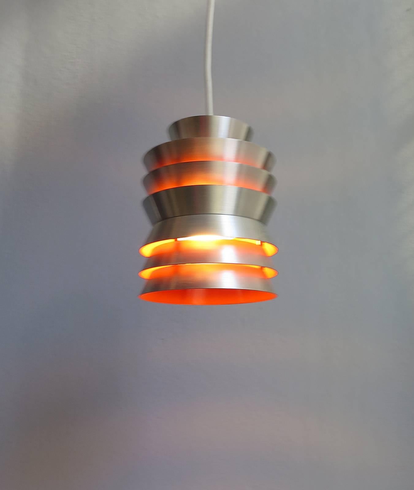 Danish aluminium and orange interior pendant lamp.