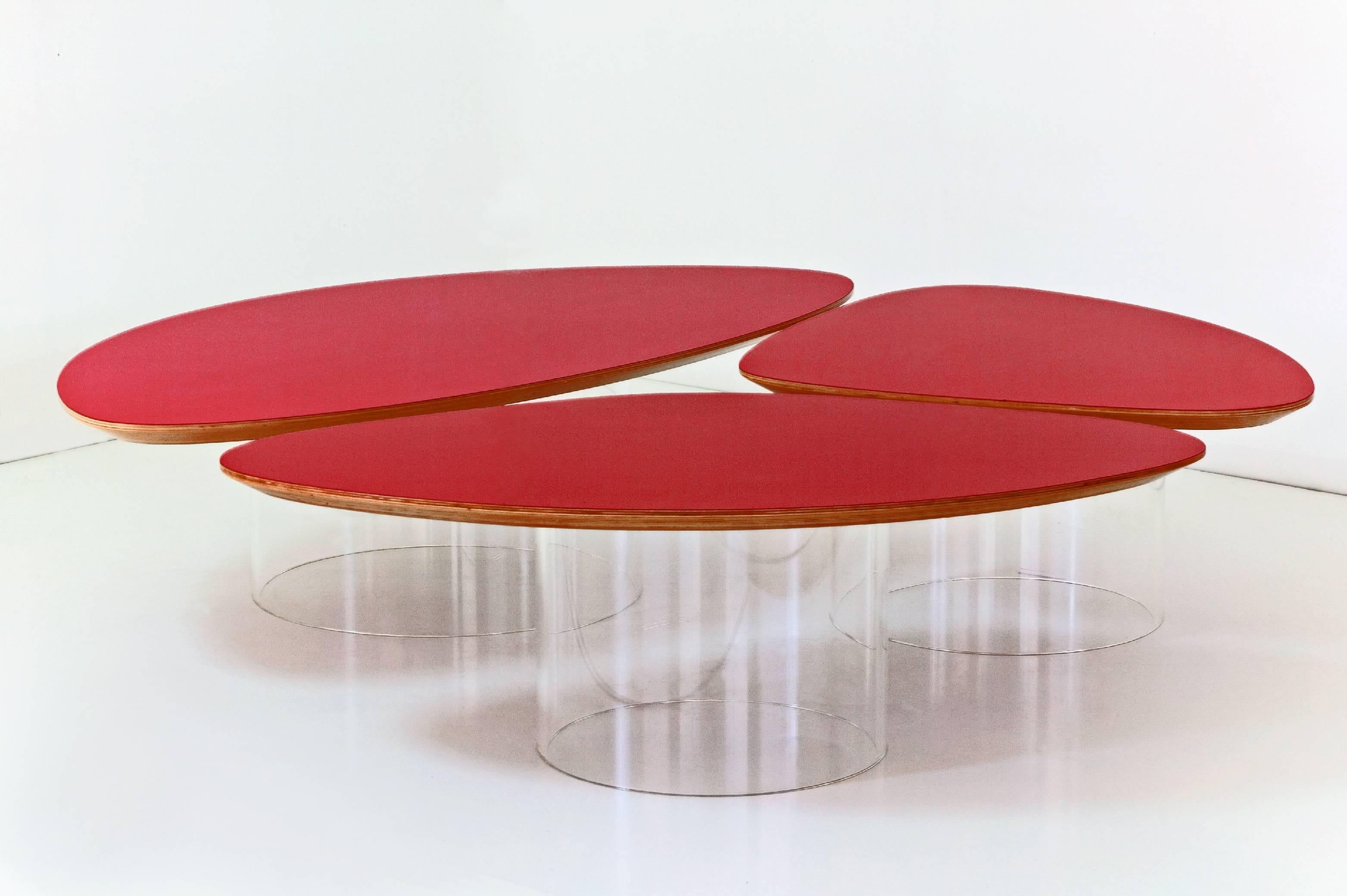 An exceptional piece. The 'edition zero' prototype for the re-issue of the iconic Nenuphar table in red was designed by Janette Laverriere in 1966. This re-edition was built under the supervision of Laverriere in collaboration with Perimeter