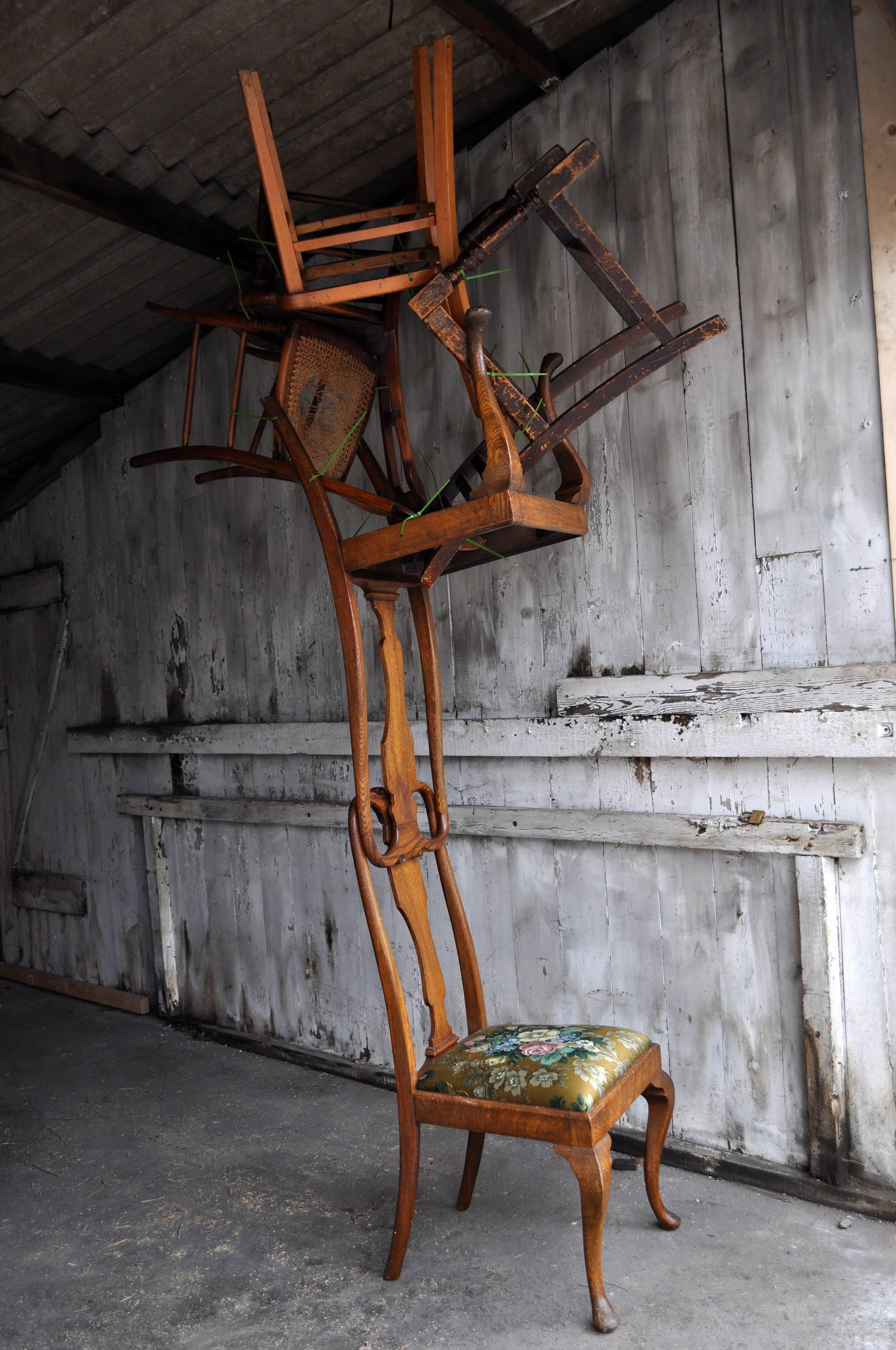 A surreal pair of trees for a living room. Constructed from discarded chairs collected from around Portsmouth.