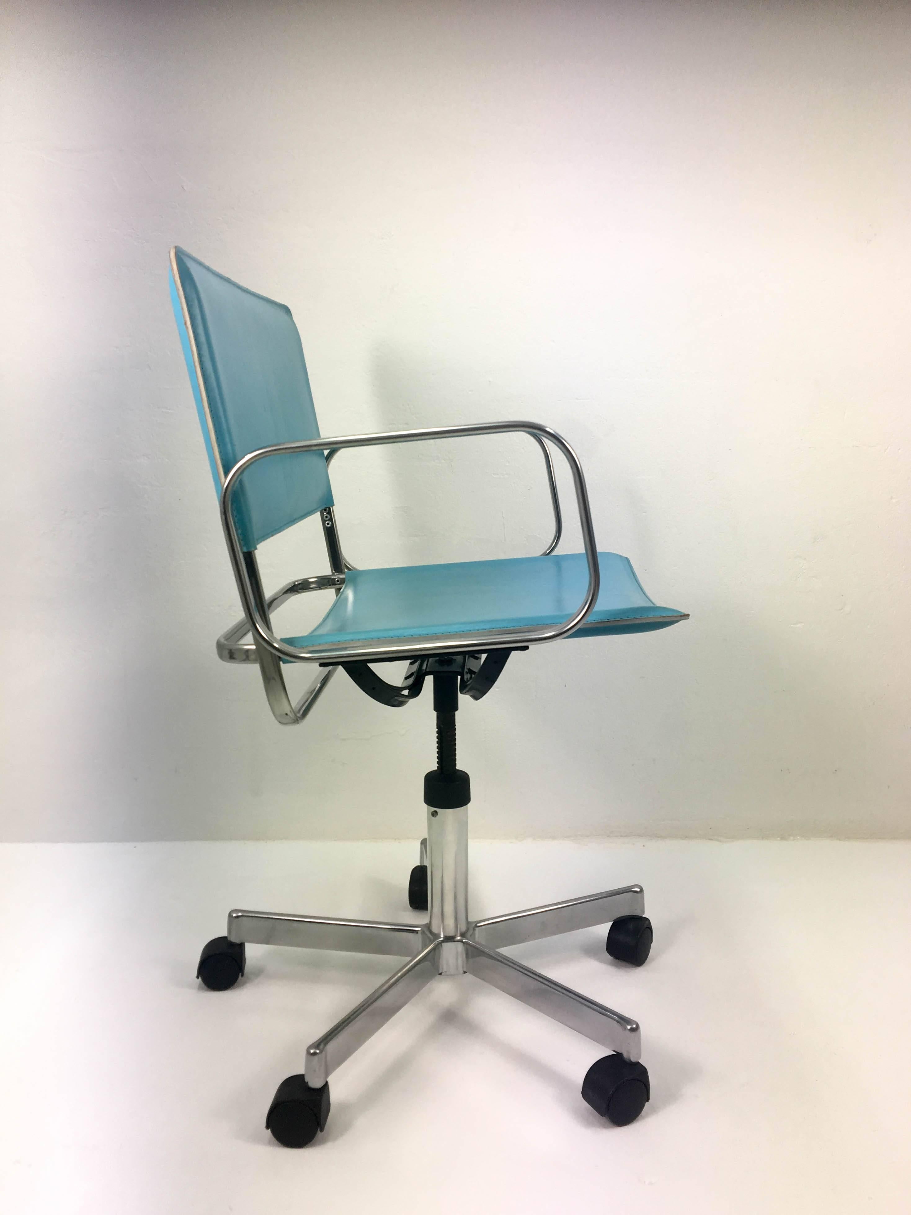 Vintage Italian Zanotta office chair in a very striking powder blue leather finish. Model Della Legge 883 ('the law 883'). Height adjustable seat on a stylish five caster base. In good condition.