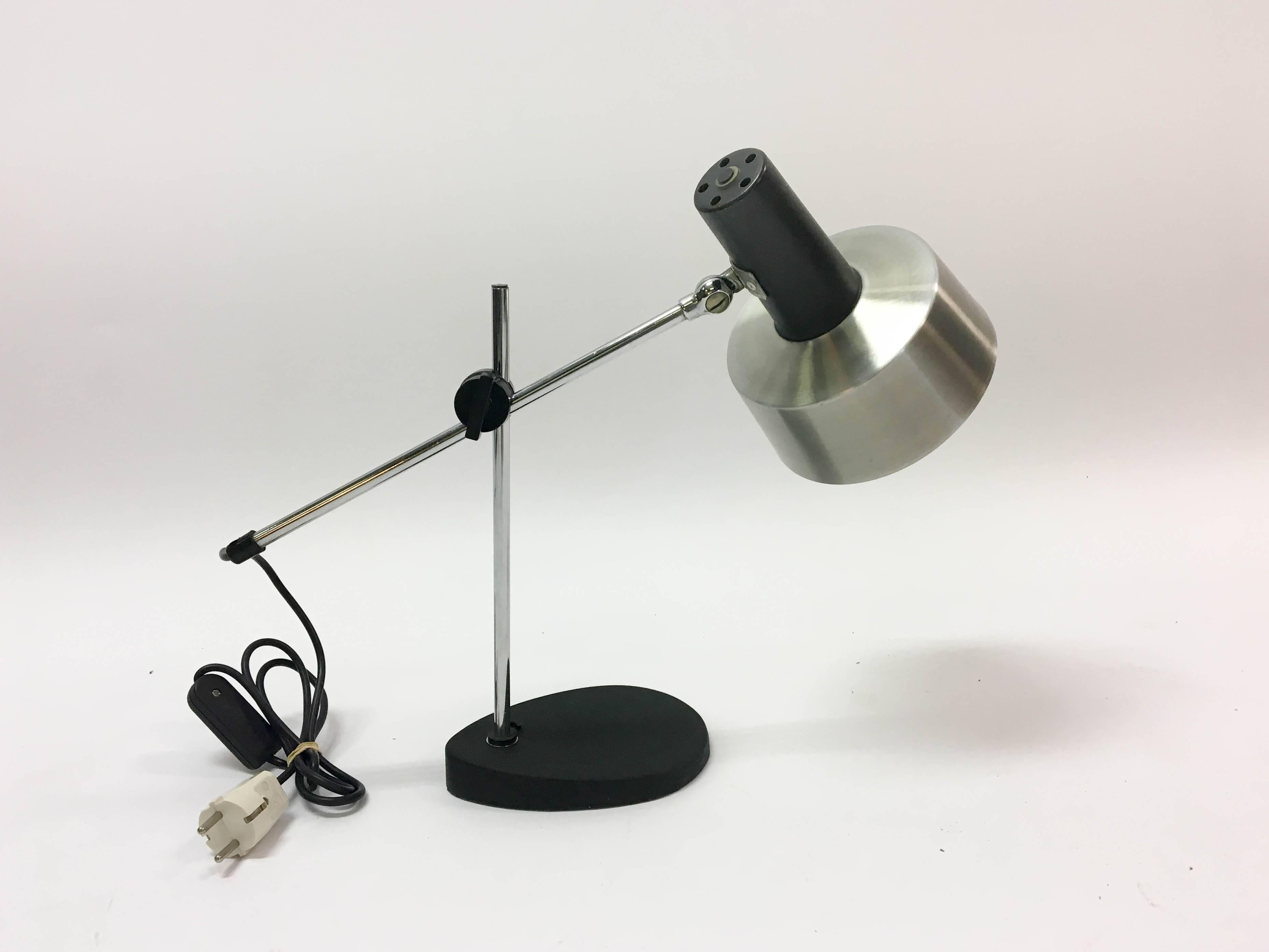 Striking desk lamp designed by J.Hoogervorst for Anvia Almelo. Aluminium hood on weighted metal base. Rewired and in very good condition.