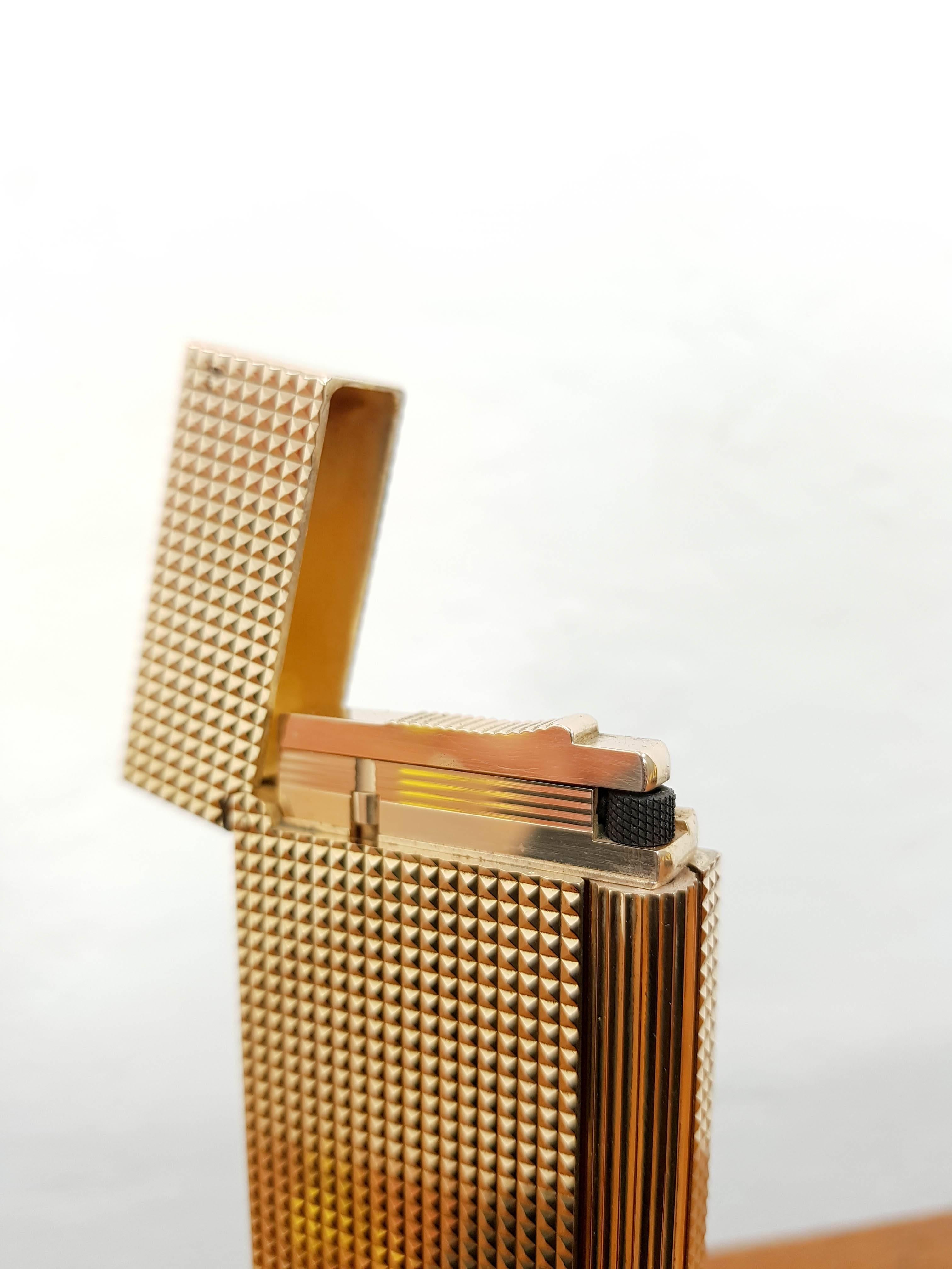 Rare table lighter version of the S.T. Dupont Ligne 2 lighter famously referred to as the greatest lighter in the world. In gold with diamond head finish. Recently serviced in Paris and includes an 18 month factory warranty. in its original leather