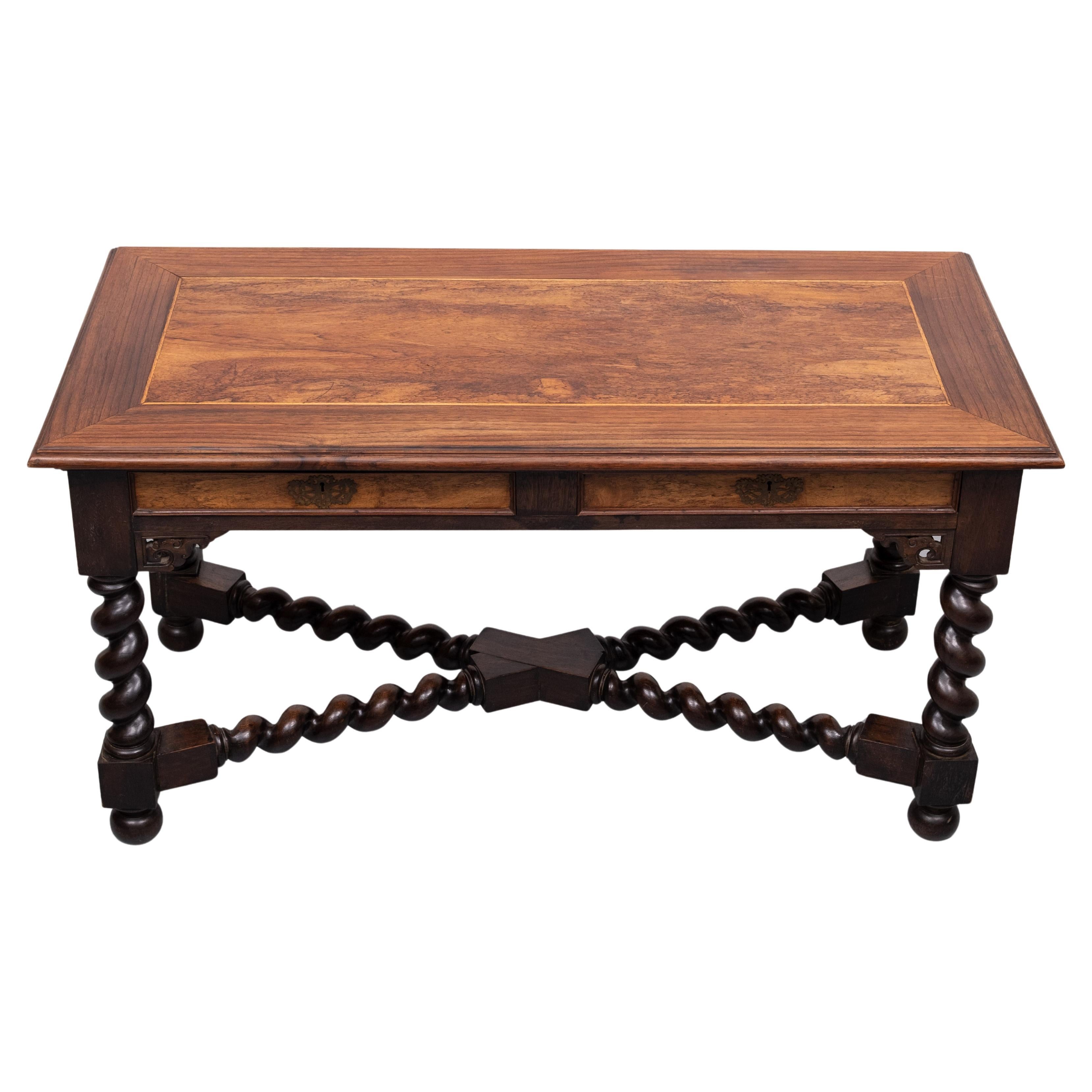 Superb Dutch Colonial Writing desk or hall table . Manufactured 
in the Dutch Indies early 19 century . Beautiful made by local craftsmen ,
But in  the typical Dutch style .Cross legged bobbing legs . Comes 
with inlay on the top . Two drawers .Very