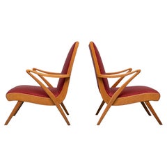 pair Organic shaped Rock & Roll Lounge Chairs new Polka Red upholstery 1950s