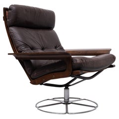 Swivel base leather lounge chair by Bruno Mathsson for Dux, Sweden 1970s