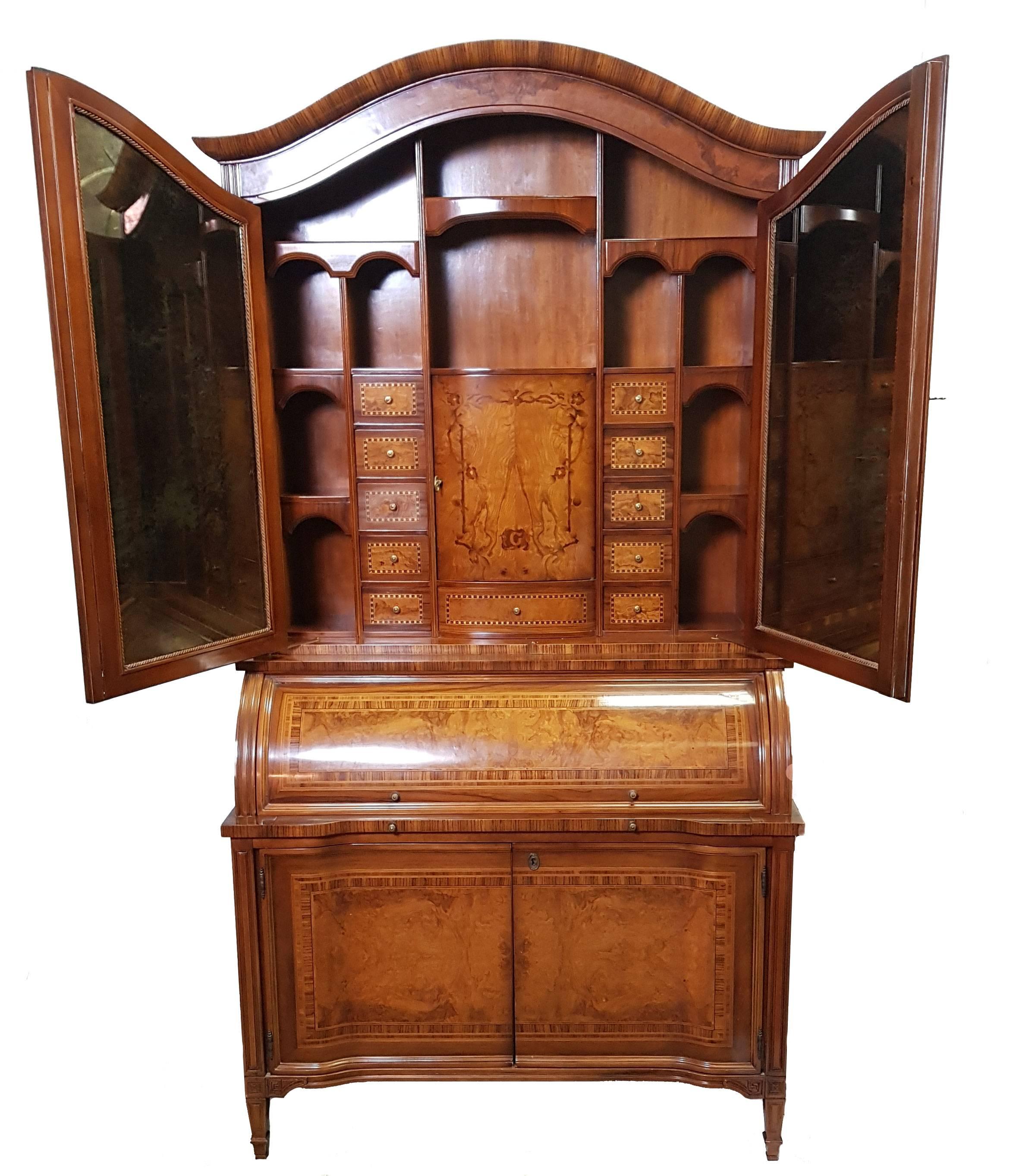 Dutch writing cabinet hand built by a master craftsman, circa 1960s featuring ornate inlay work and numerous drawers and compartments. Very impressive piece and great quality.