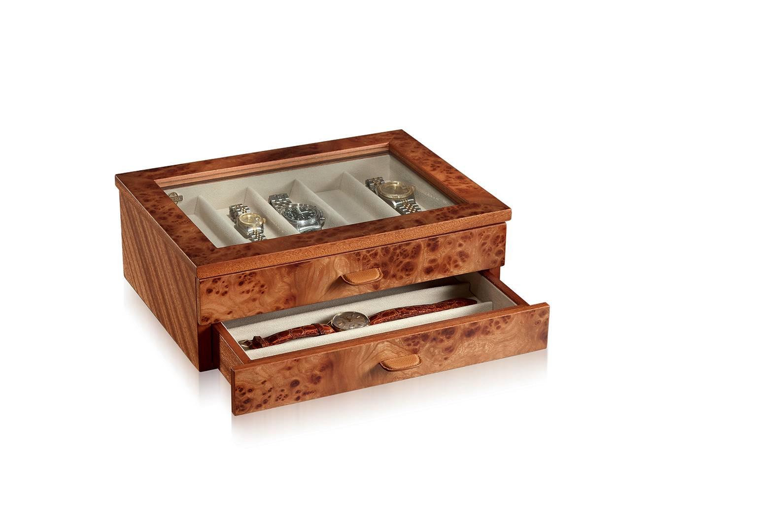 Elm briar and striped mahogany for your collectable watches. Leather handles. Briar box for nine watches.