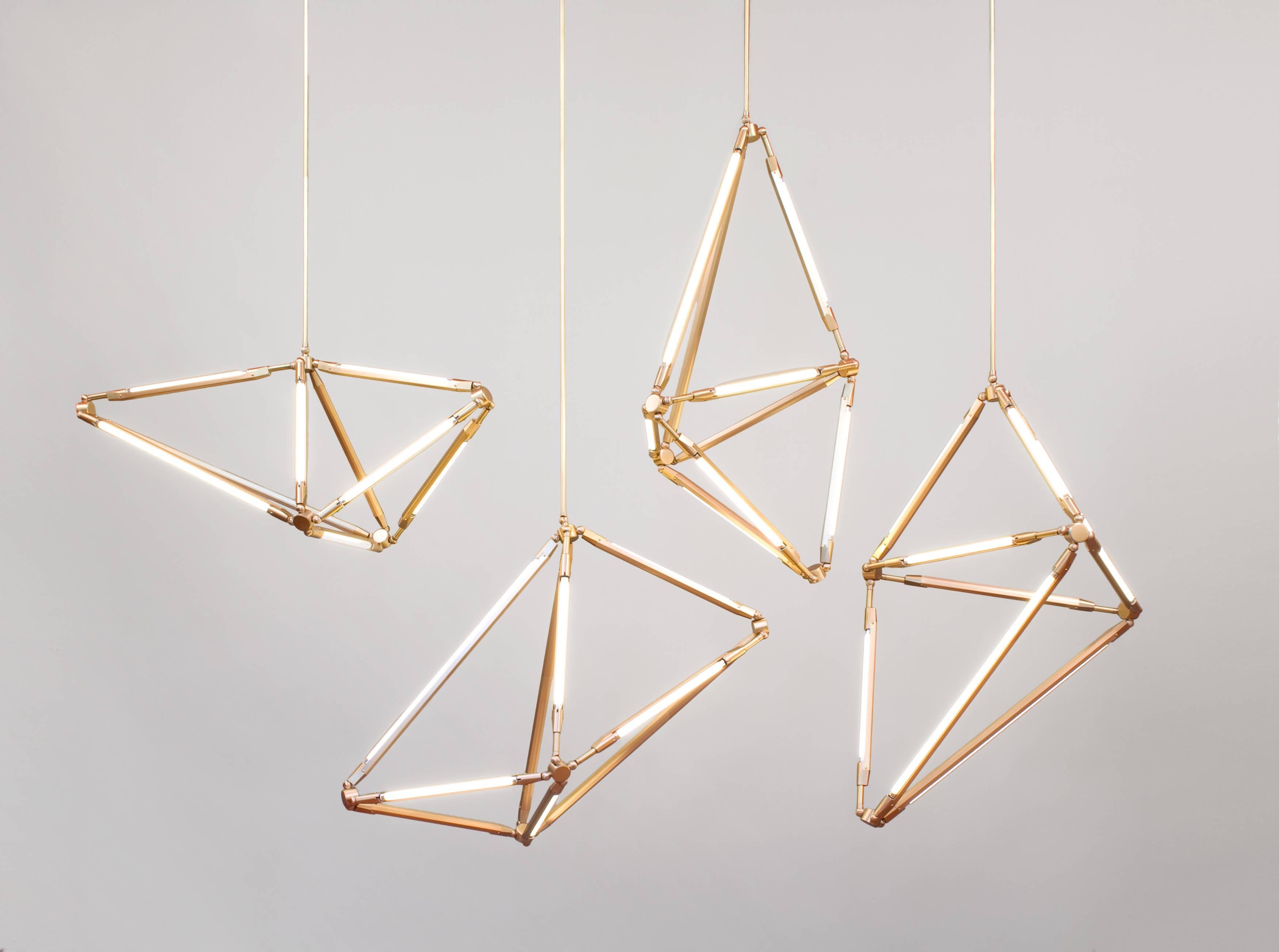 The Shy light uses the spare beauty of thin LED tubes to define the edges of its shape; in this way the function of the piece is created by its form, and vice-versa. It is also inspired by crystalline structures, both by the shapes they take as well