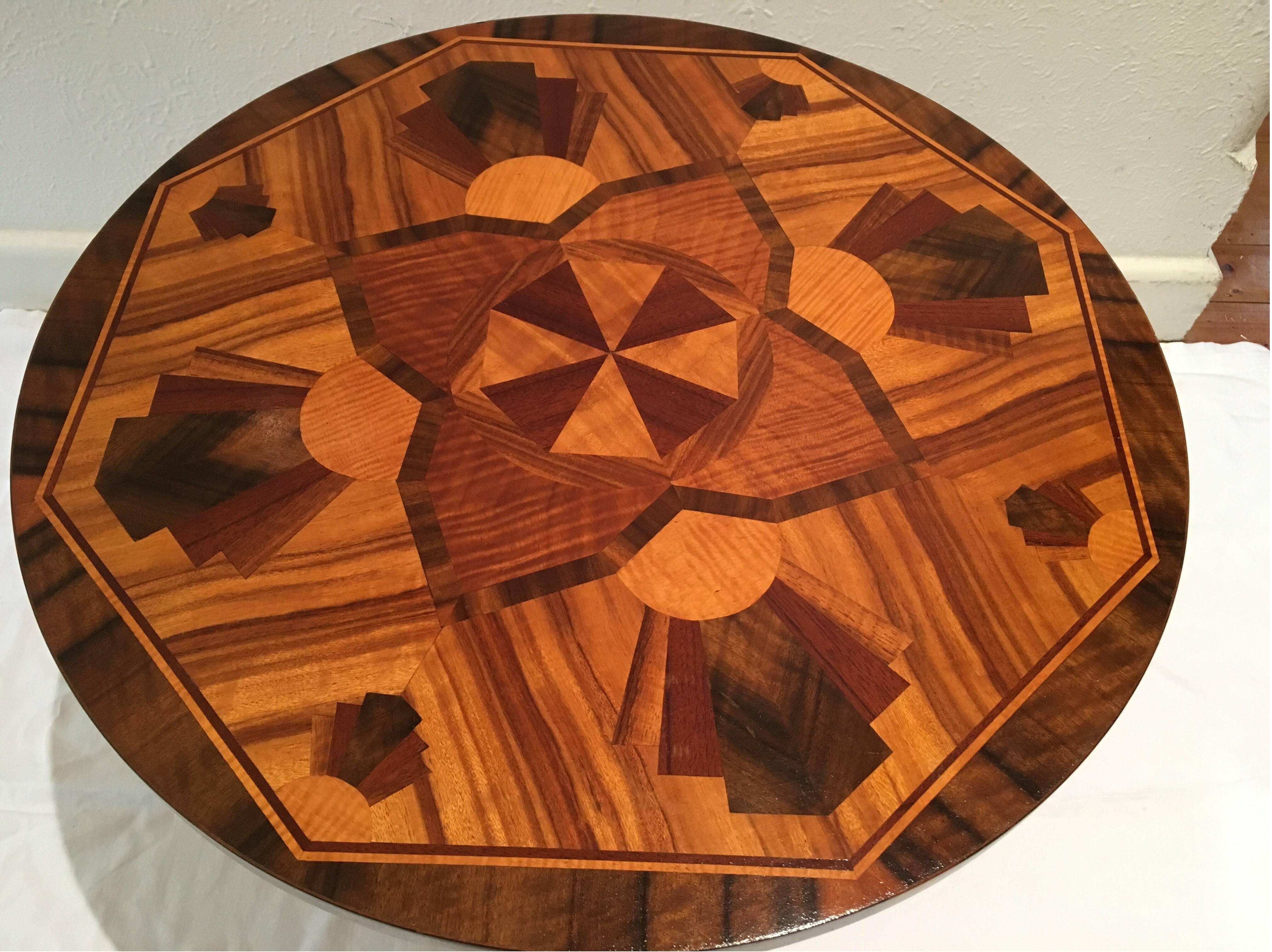 Australian Art Deco side table circa 1930s with decorative marquetry inlay.

An exceptionally high quality piece, made of beautiful walnut with intricate Art Deco tabletop design, in excellent condition.