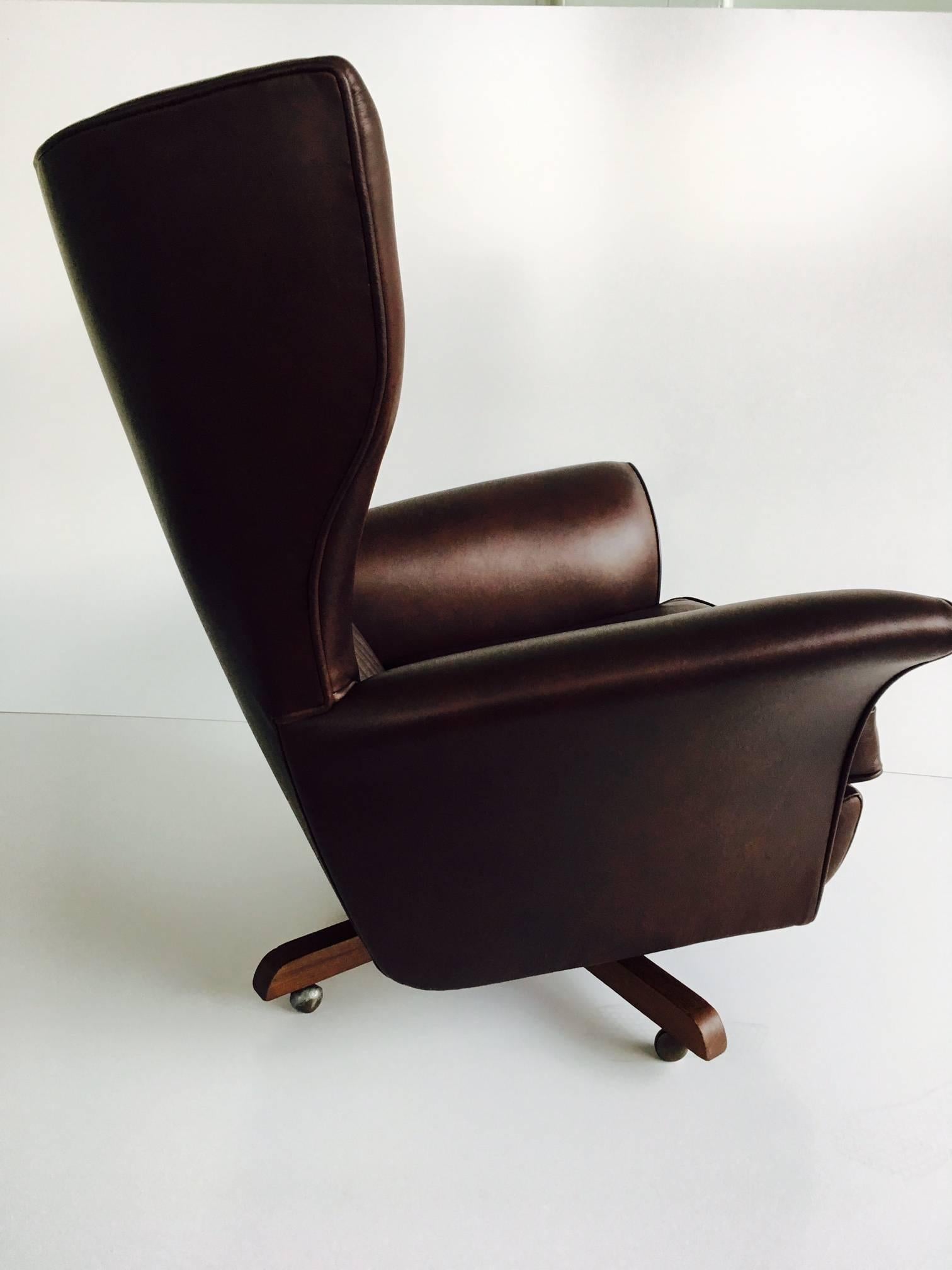 Original 1962 leather 6250 swivel wing chair by G Plan Furniture.

Aptly known as ‘The World’s Most Comfortable Chair’ it has a distinctive winged design, soft foam cushioning and deeply buttoned back, provide the ultimate in comfort.

Newly