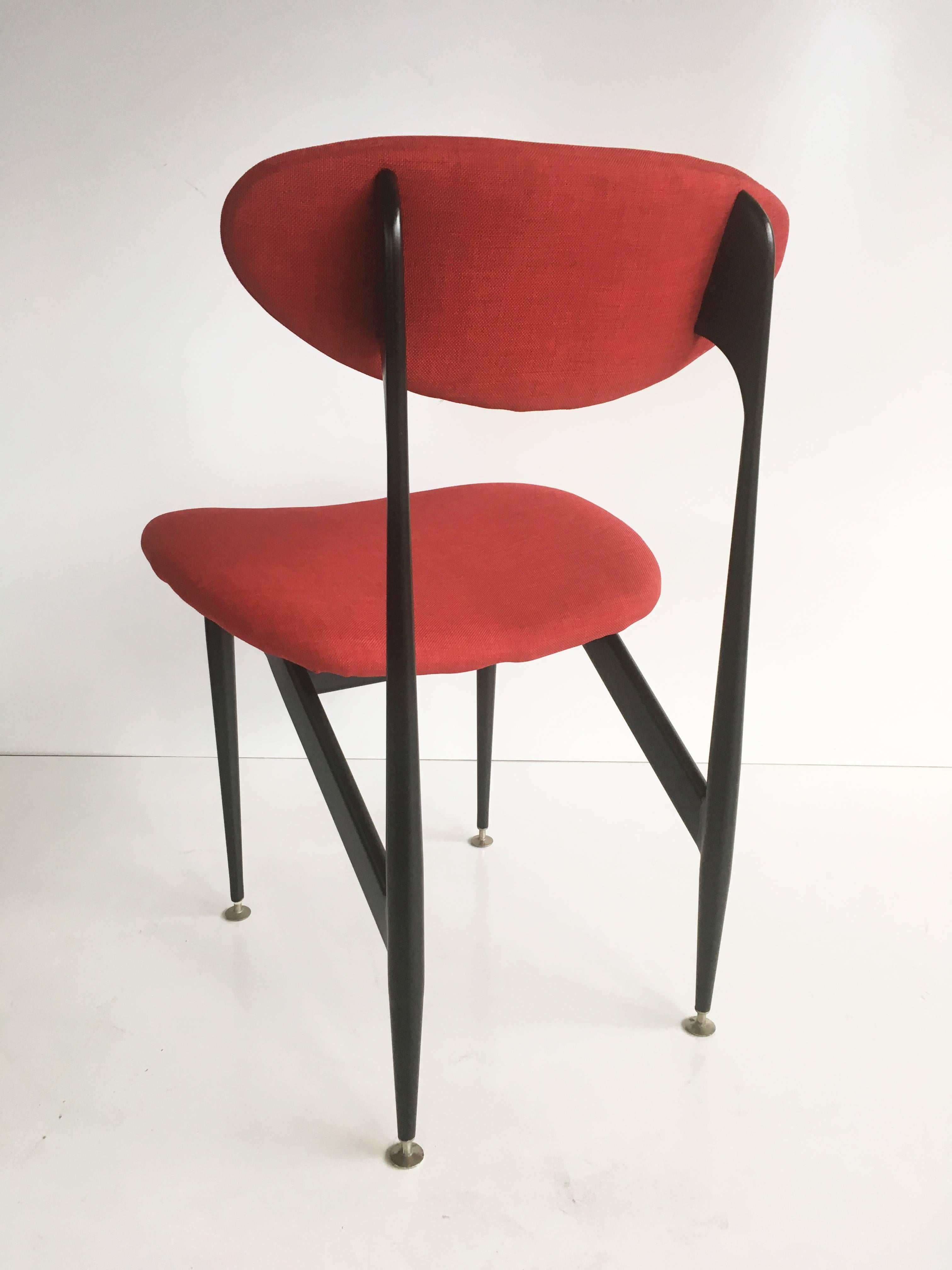 Set of four 'Scape' dining chairs, designed by renowned Australian furniture designer Grant Featherston. 

Manufactured by Aristoc Industries Melbourne.

Fully restored with newly coated frame, and upholstered in high quality textured red