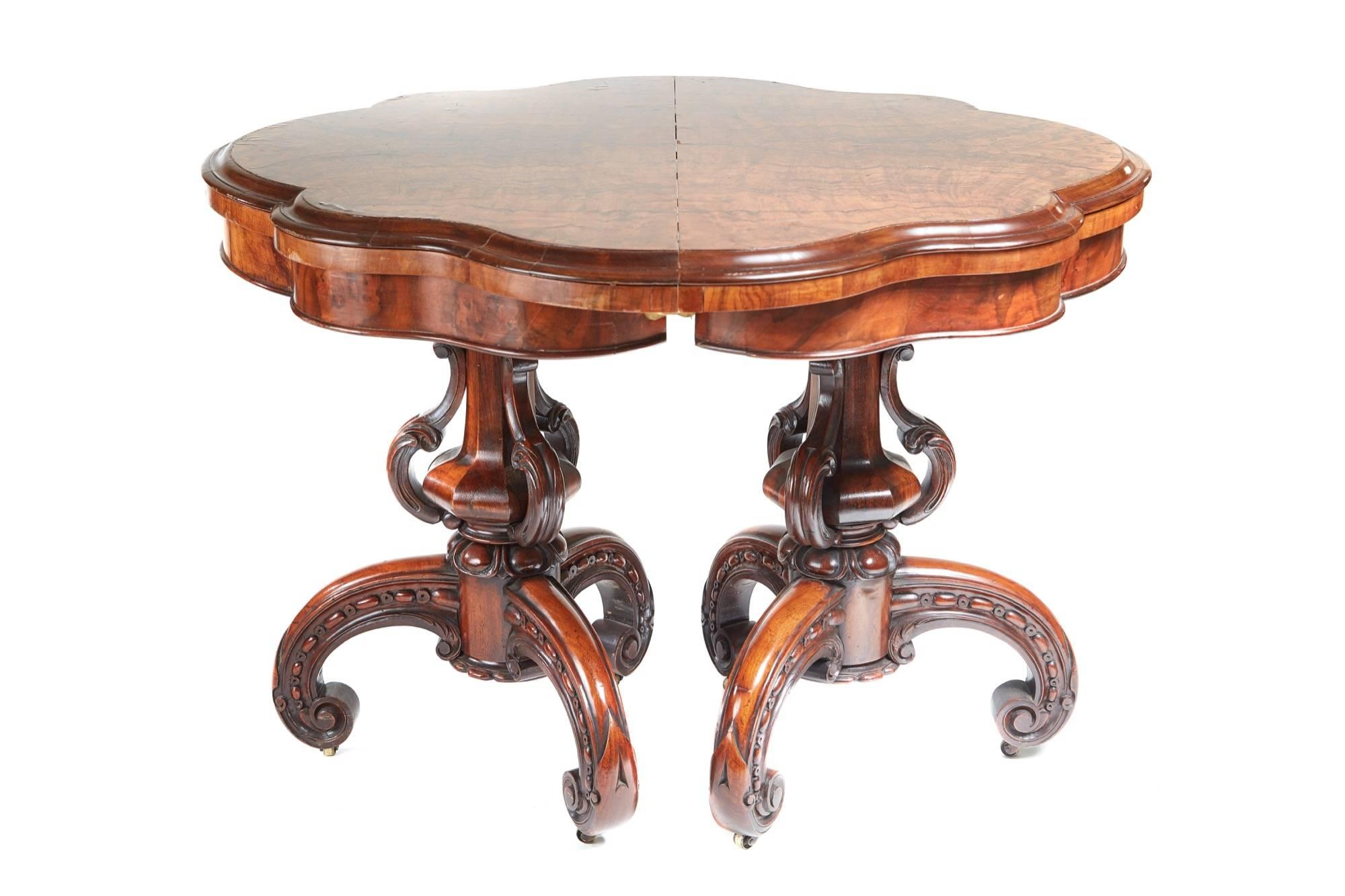 A fantastic rare and unusual pair of burr walnut card tables, with serpentine shaped burr walnut tops, the thumb moulded top lifts and swivel to reveal the original green baize interior the serpentine shaped frieze conceals a storage area for cards