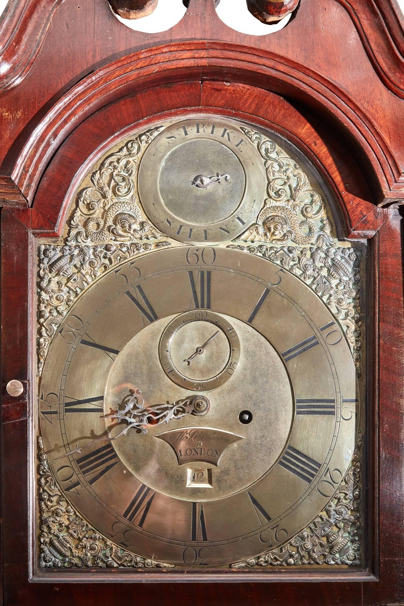 Mahogany inlaid brass face 8 day grandfather clock, ste'pierfsene London ,date 1760,with a swan-neck pediment original finial, reeded columns to the hood, the arched brass dial movement is of typical London manufacture being five pillar construction