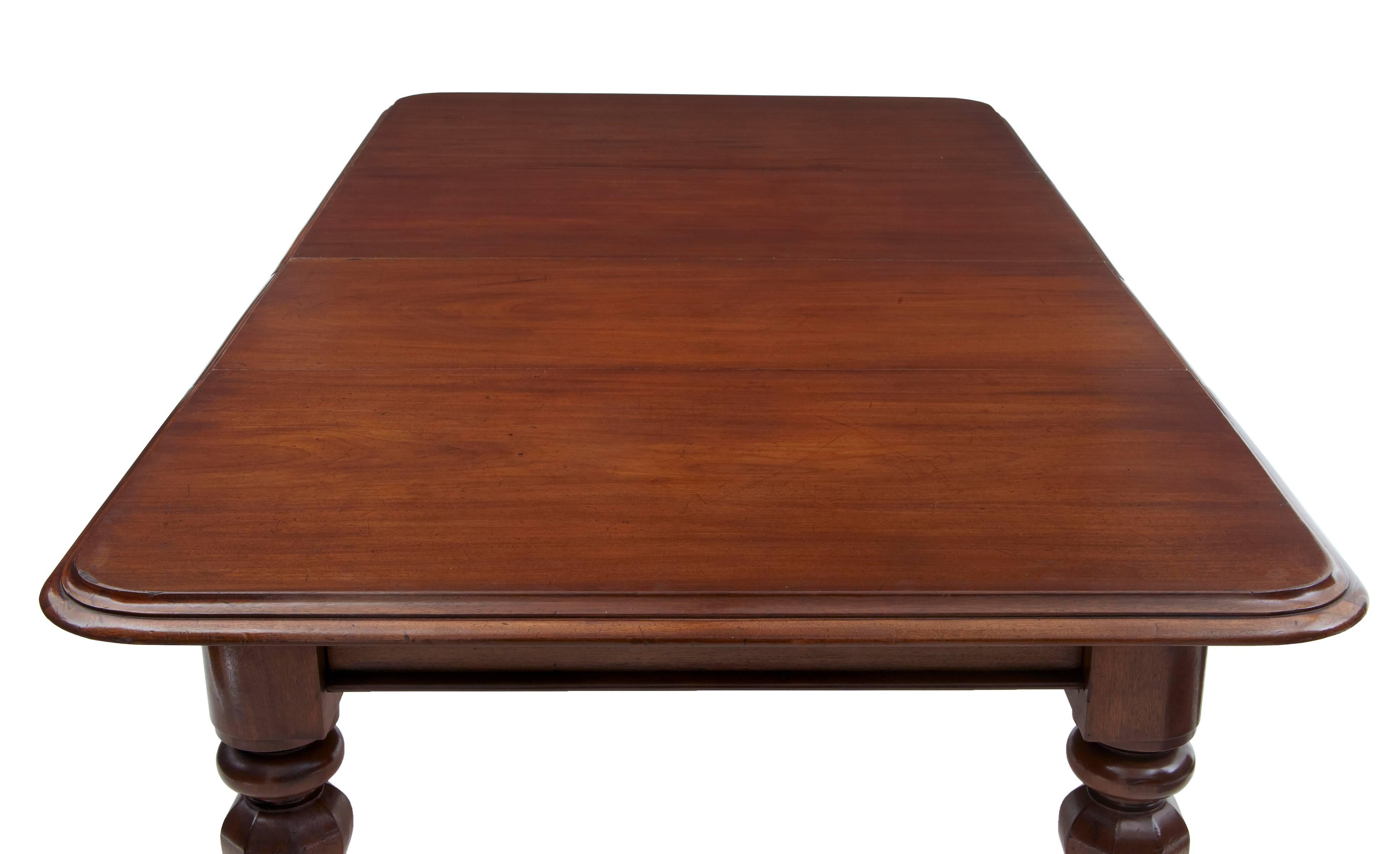 William IV solid mahogany extending dining table with two large original solid mahogany leaves, the top having a double moulded edge, pull-out mechanism, standing on four shaped octagonal mahogany legs with original brass castors
History of the