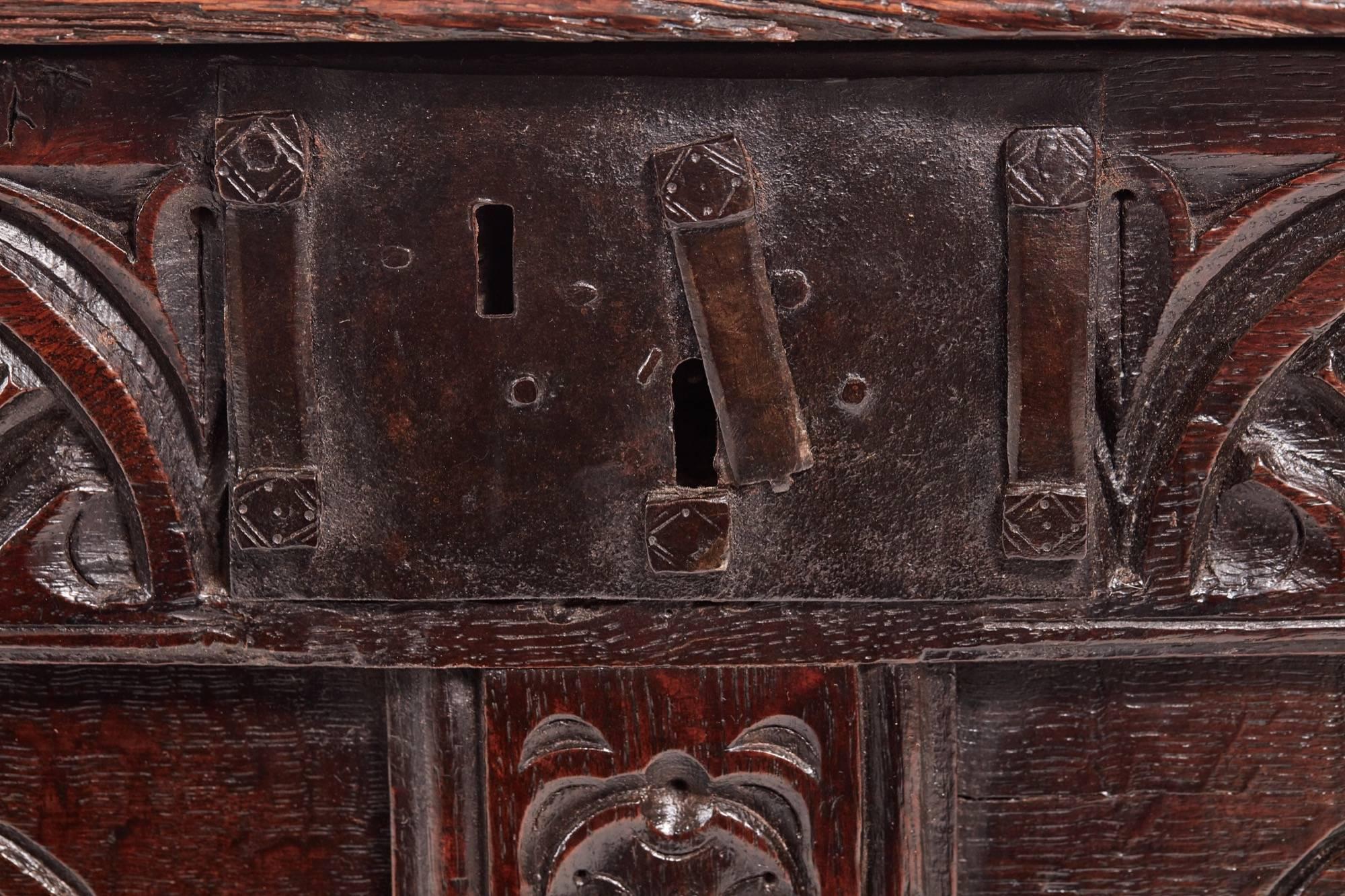 17th century carved oak coffer, finely carved detail to the panels, carved frieze, panelled sides, fantastic color, lovely iron lock plate,
lovely color and condition.