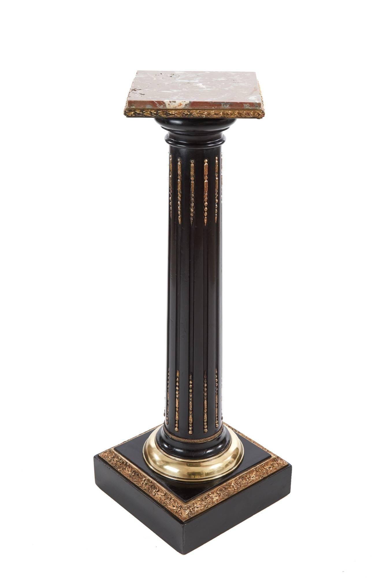French ebonized and ormolu-mounted pedestal column, with a ormolu-mounted swivel marble top, reeded ebonised column with brass mounts and brass collar, standing on a ormolu-mounted plinth base
Lovely color and condition.