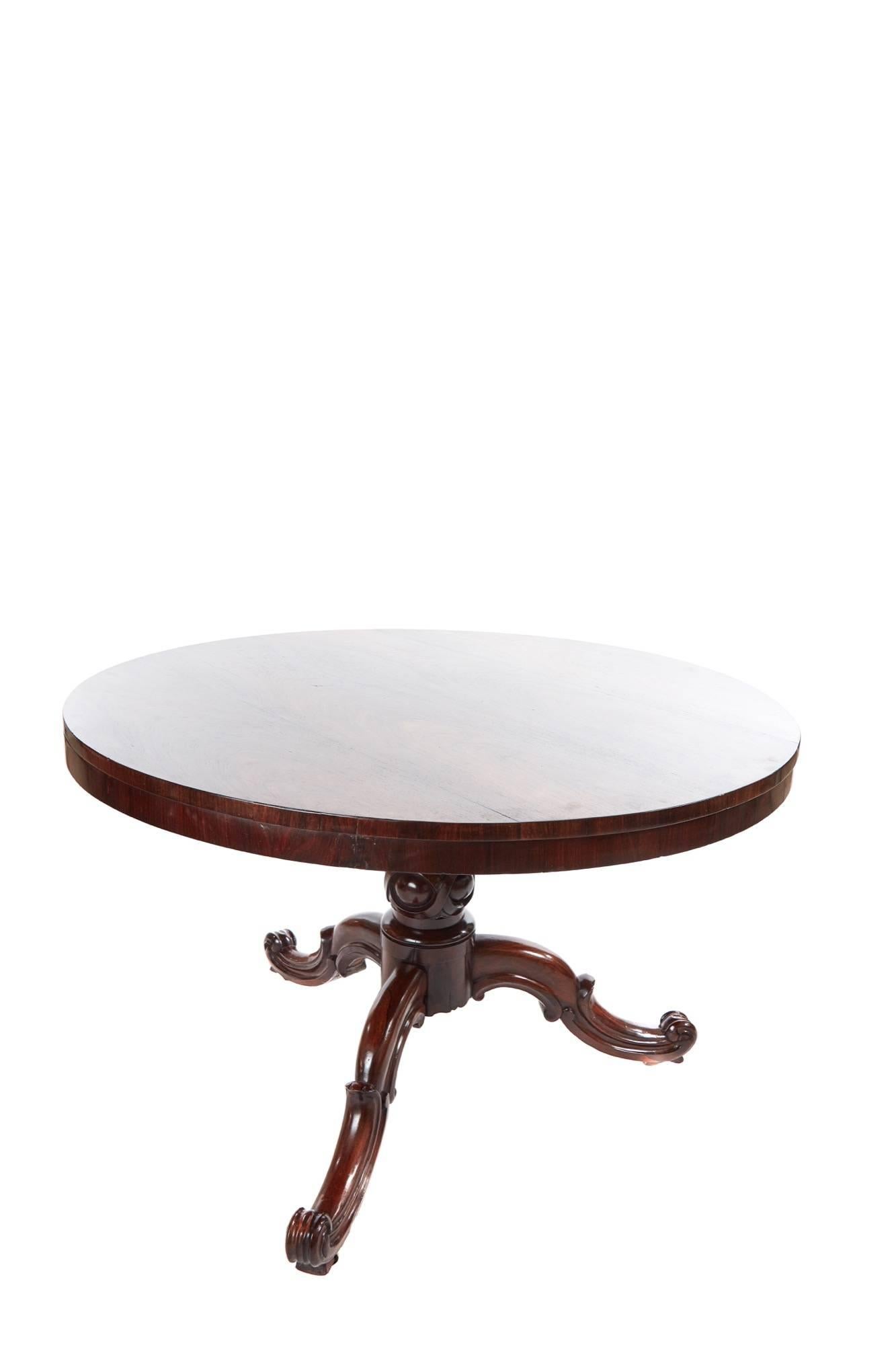 Victorian round rosewood centre table, with a lovely figured rosewood tilt top, solid rosewood carved turned column support with three carved solid rosewood shaped cabriole legs, original castors
Fantastic color and condition.