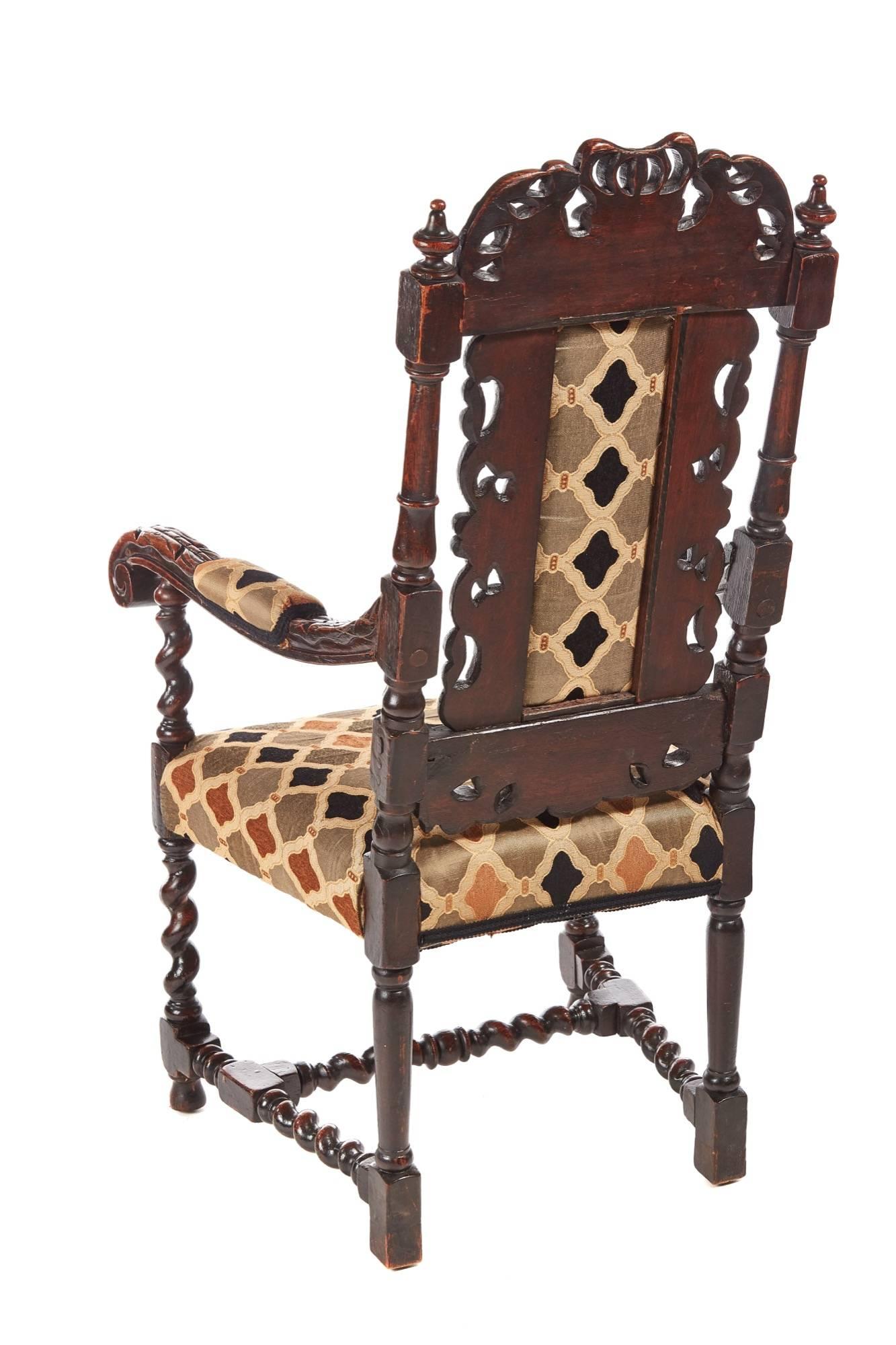Fantastic antique carved oak throne chair, lovely carved detail to the top, carved back, lovely shaped carved arms, standing on barley twist legs to the front, turned back legs, united by barley twist stretchers
Newly re-upholstered
Fantastic