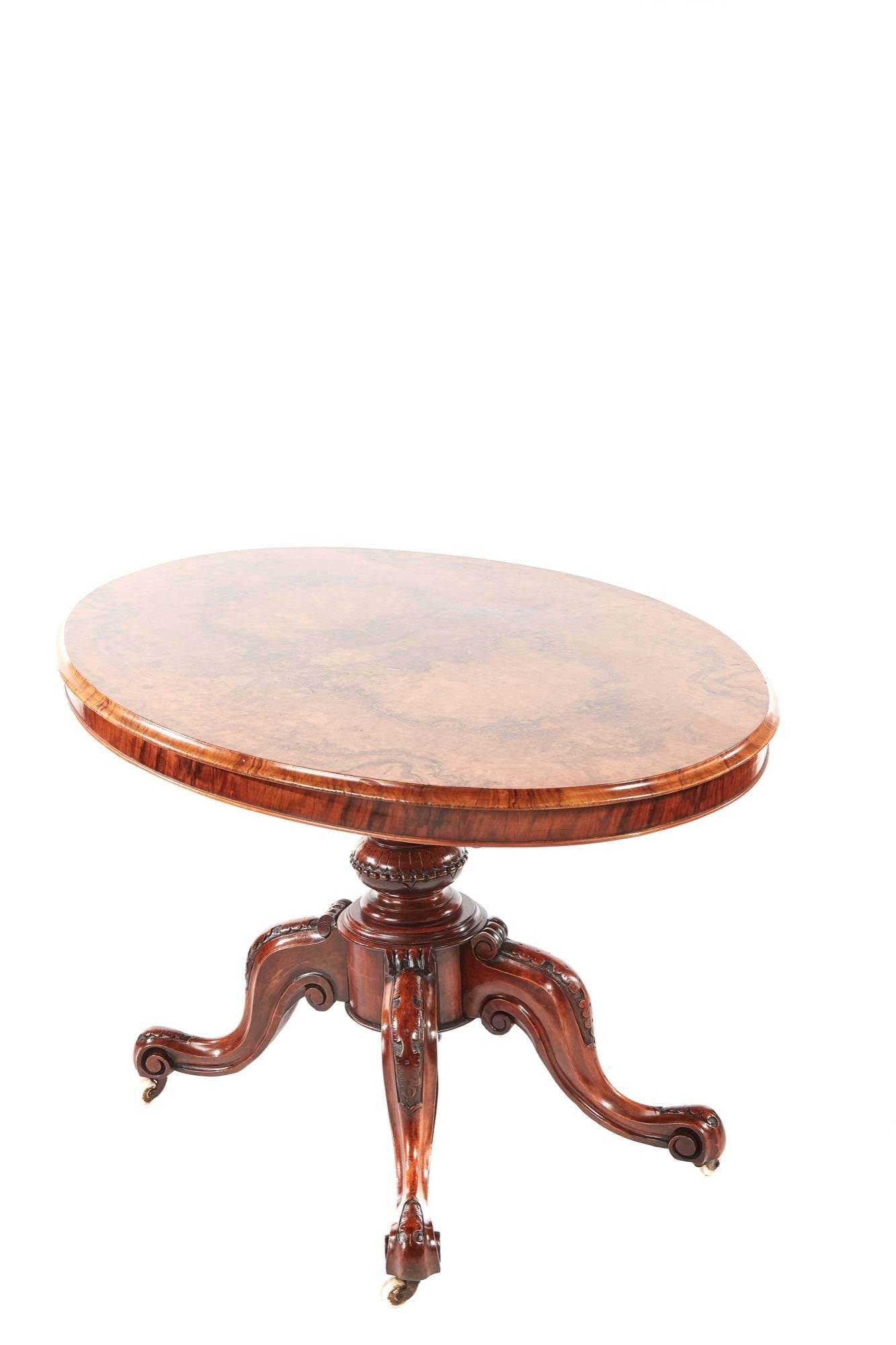 Fine quality oval Victorian burr walnut centre table, the tilt top having fantastic matched burr walnut veneers with thumb moulded edge, solid walnut base with a carved shaped centre column supported on four carved solid walnut shaped cabriole legs