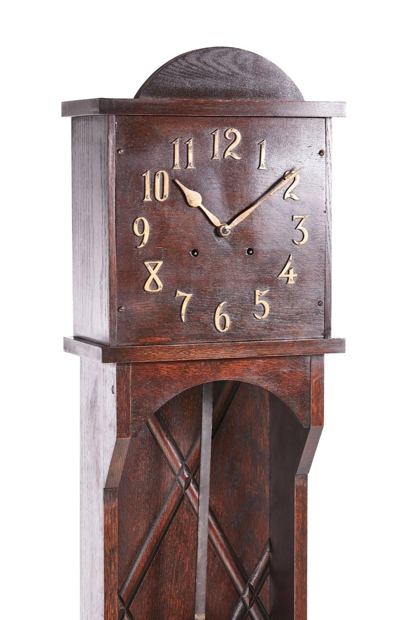 Unusual Art Deco 8 day longcase clock, the oak case having a shaped pediment, unusual open face with brass hands, open case with a reeded back, reeded base standing on a shaped plinth, original key, working order
Lovely original color and