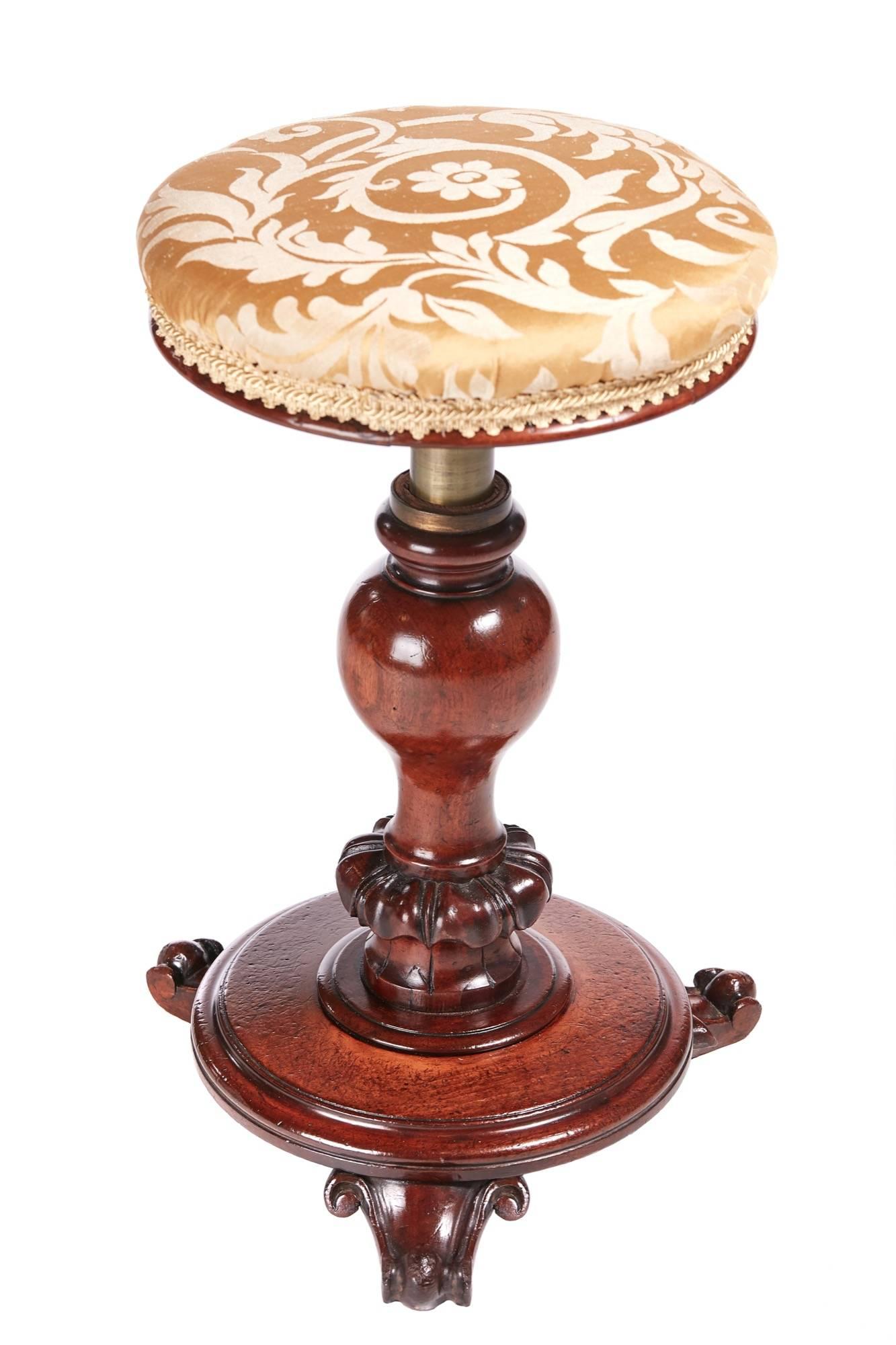 Quality Victorian mahogany revolving music stool, with a lovely carved shaped column on a round base with three shaped carved feet ,all in solid mahogany
Lovely color and condition
Measures: 12